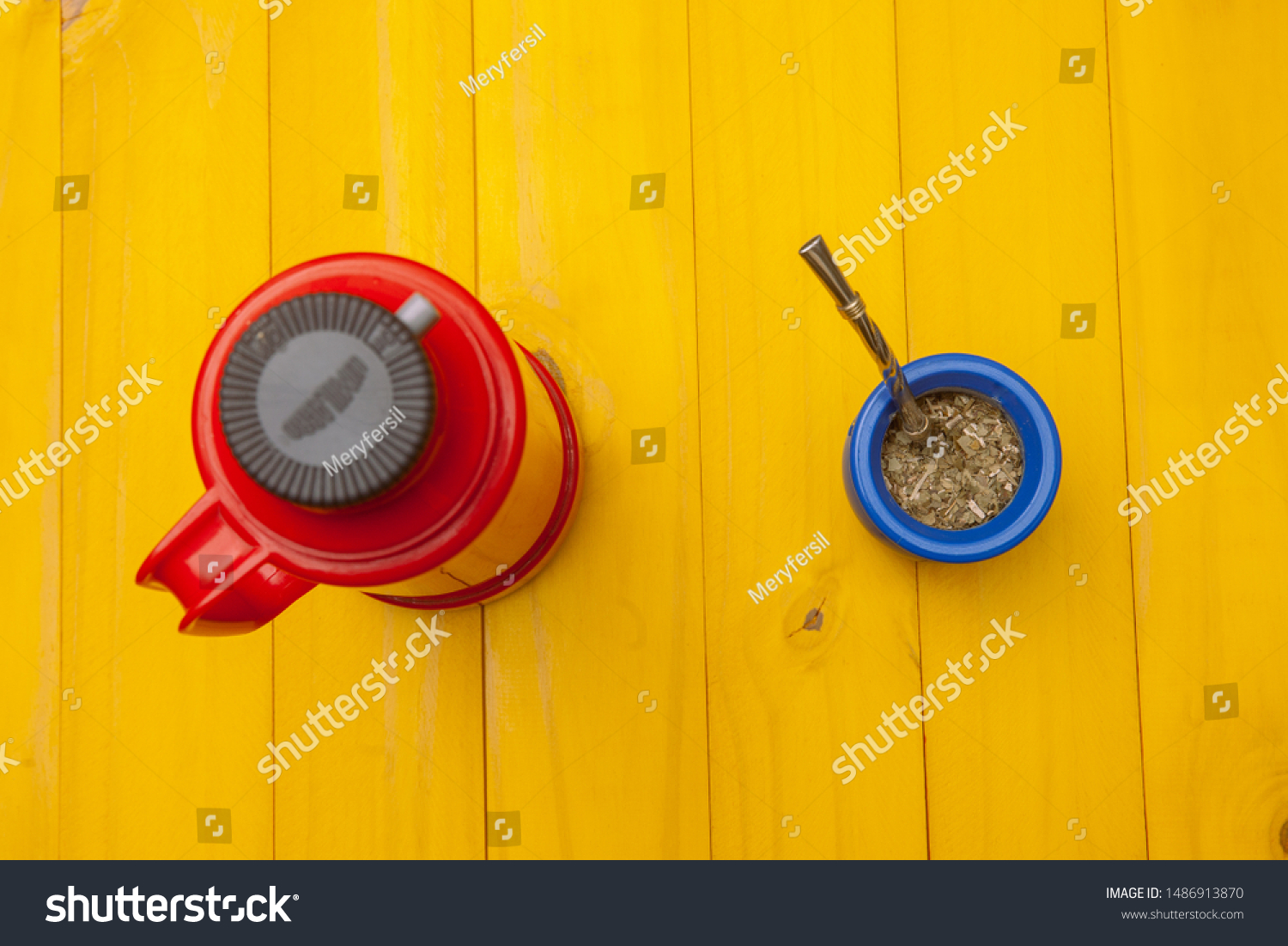 Download Blue Matte Red Thermos Yellow Wooden Stock Photo Edit Now 1486913870 Yellowimages Mockups