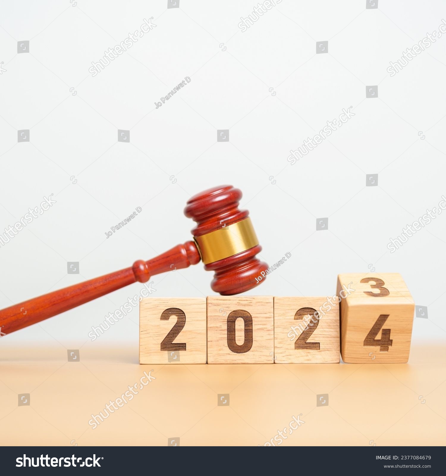 2023 chcnge to 2024 year block with judge gavel on table. Law, lawyer