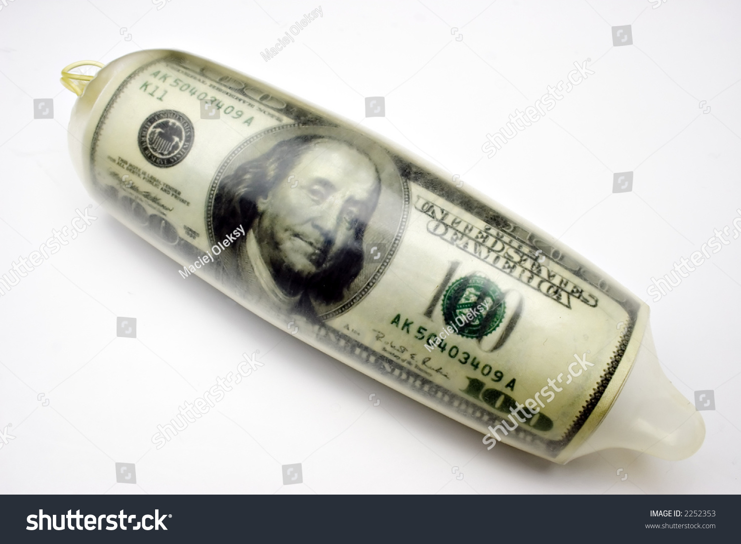 stock-photo--dollar-bills-wrapped-in-con