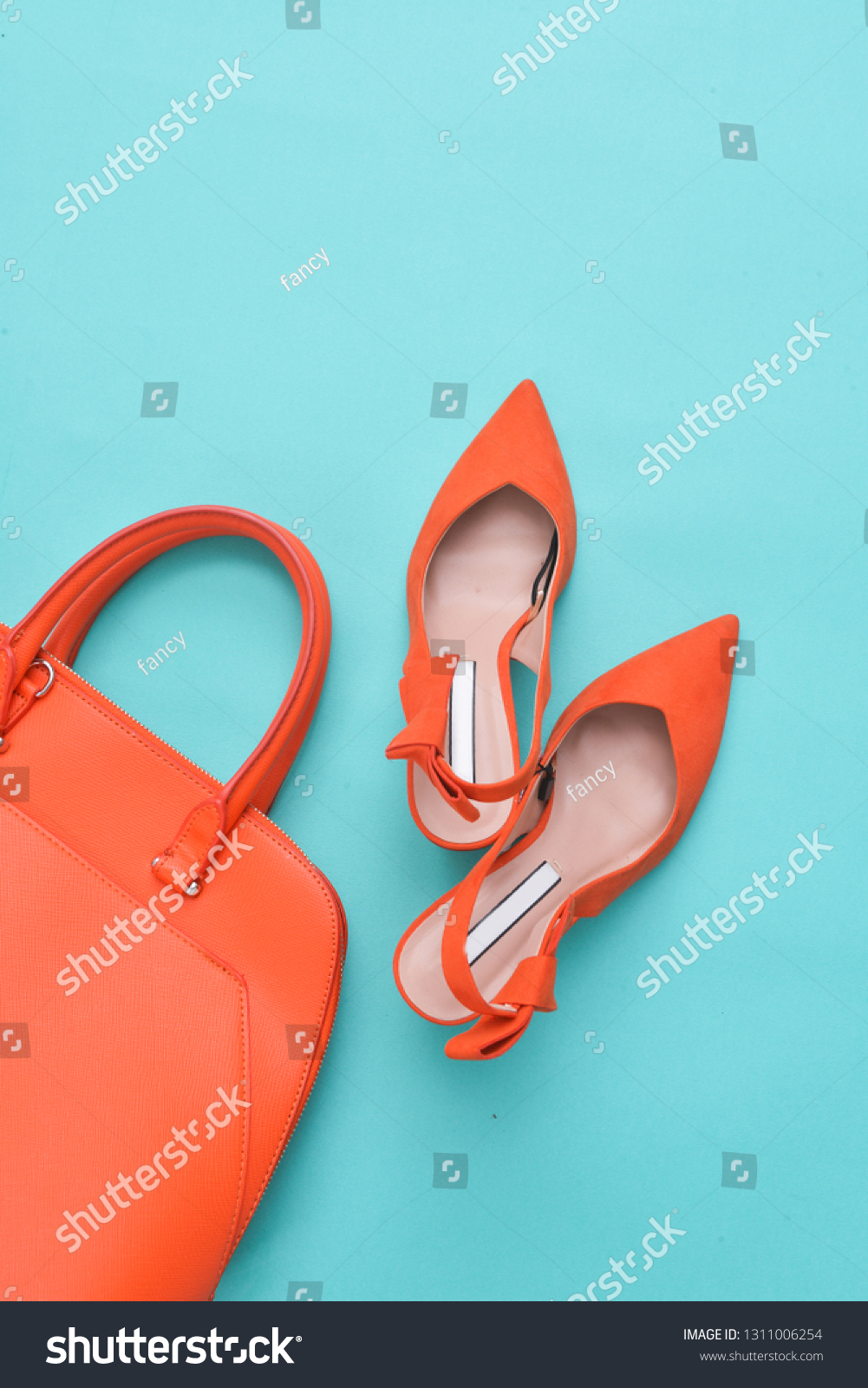 orange heels and bag