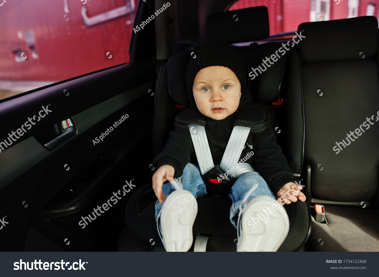 baby car seat on restaurant high chair