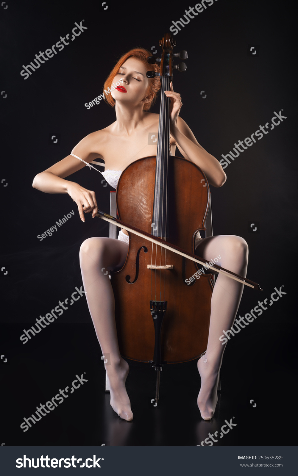 Girl Playing The Bass Naked