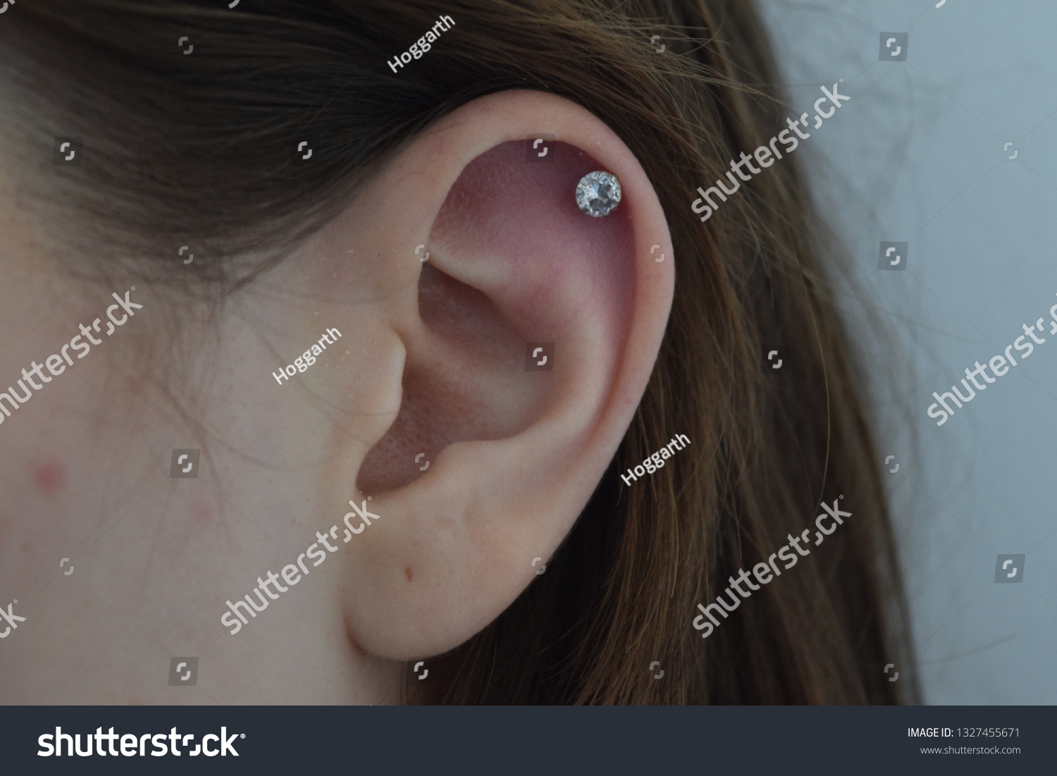 537 Helix piercing Images, Stock Photos & Vectors | Shutterstock