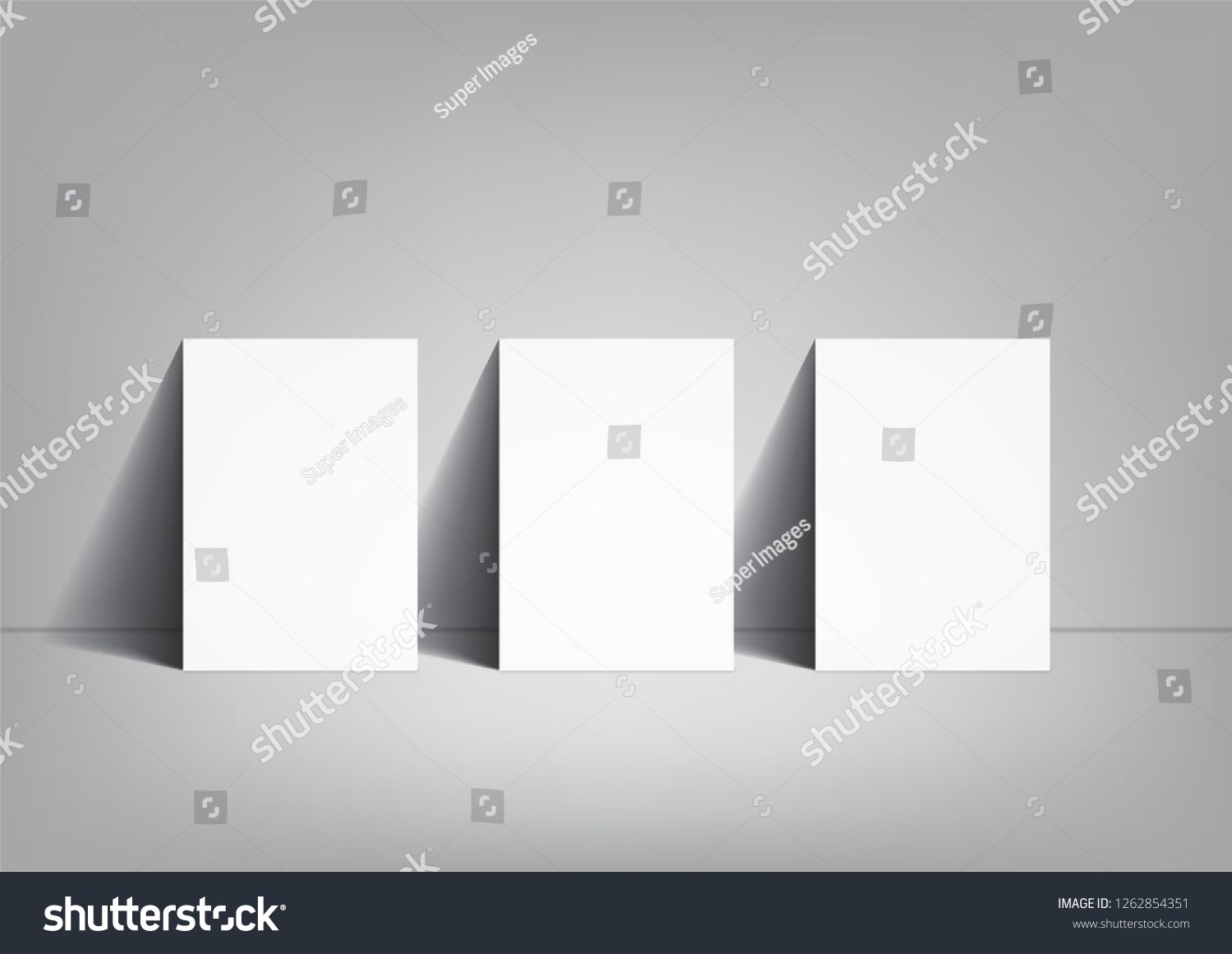 3 Poster Mockup On Grey Background Stock Photo Edit Now