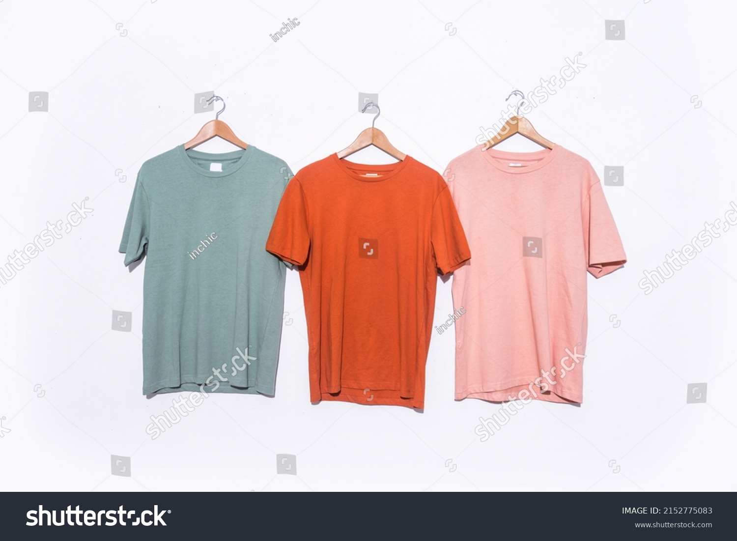 Three Tshirt Mockup Hanging On Clothing Stock Photo 2152775083 ...