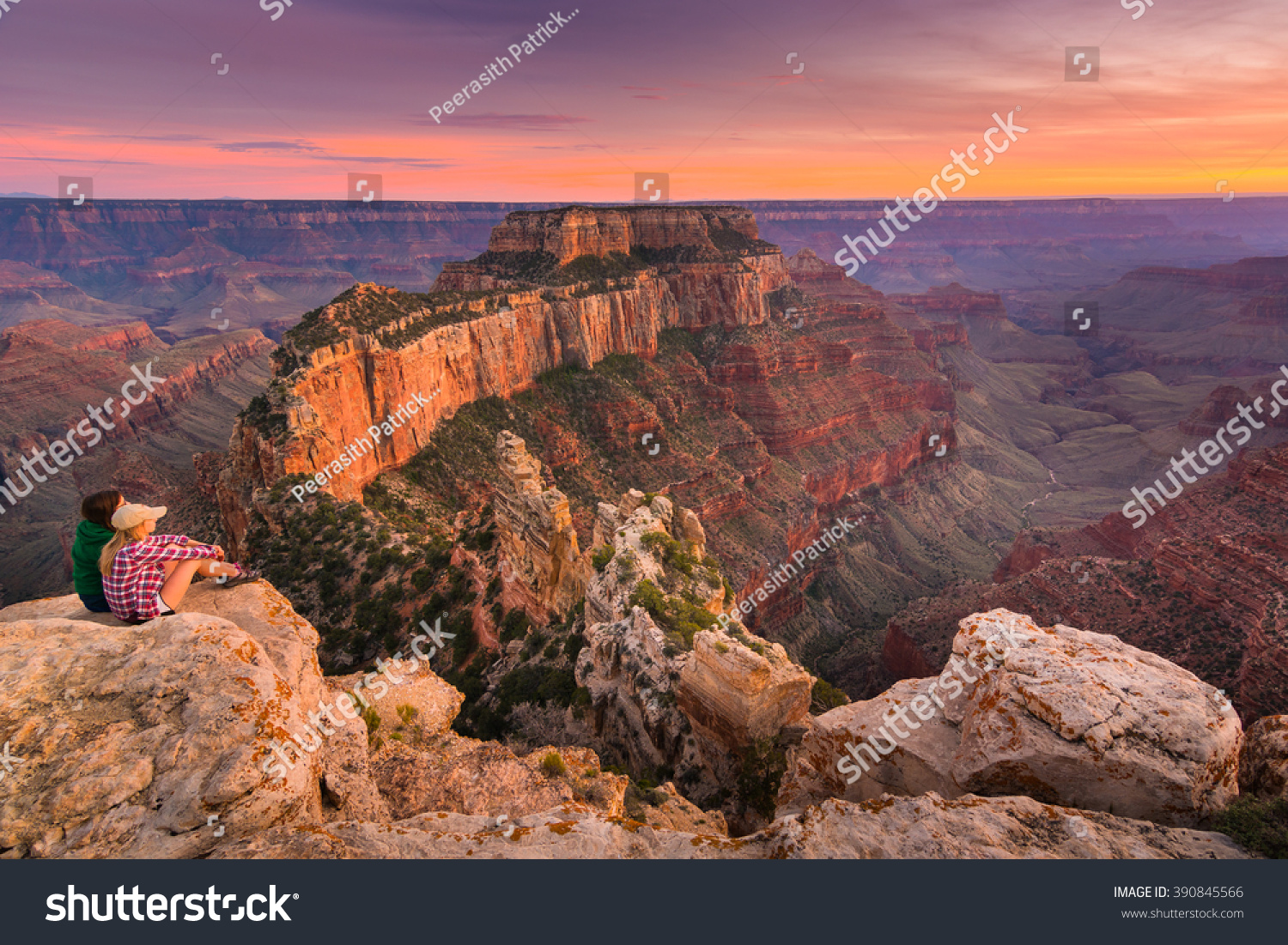 (Untouched) A Group Of People Was Sitting Near The Edge Watching Sunset ...