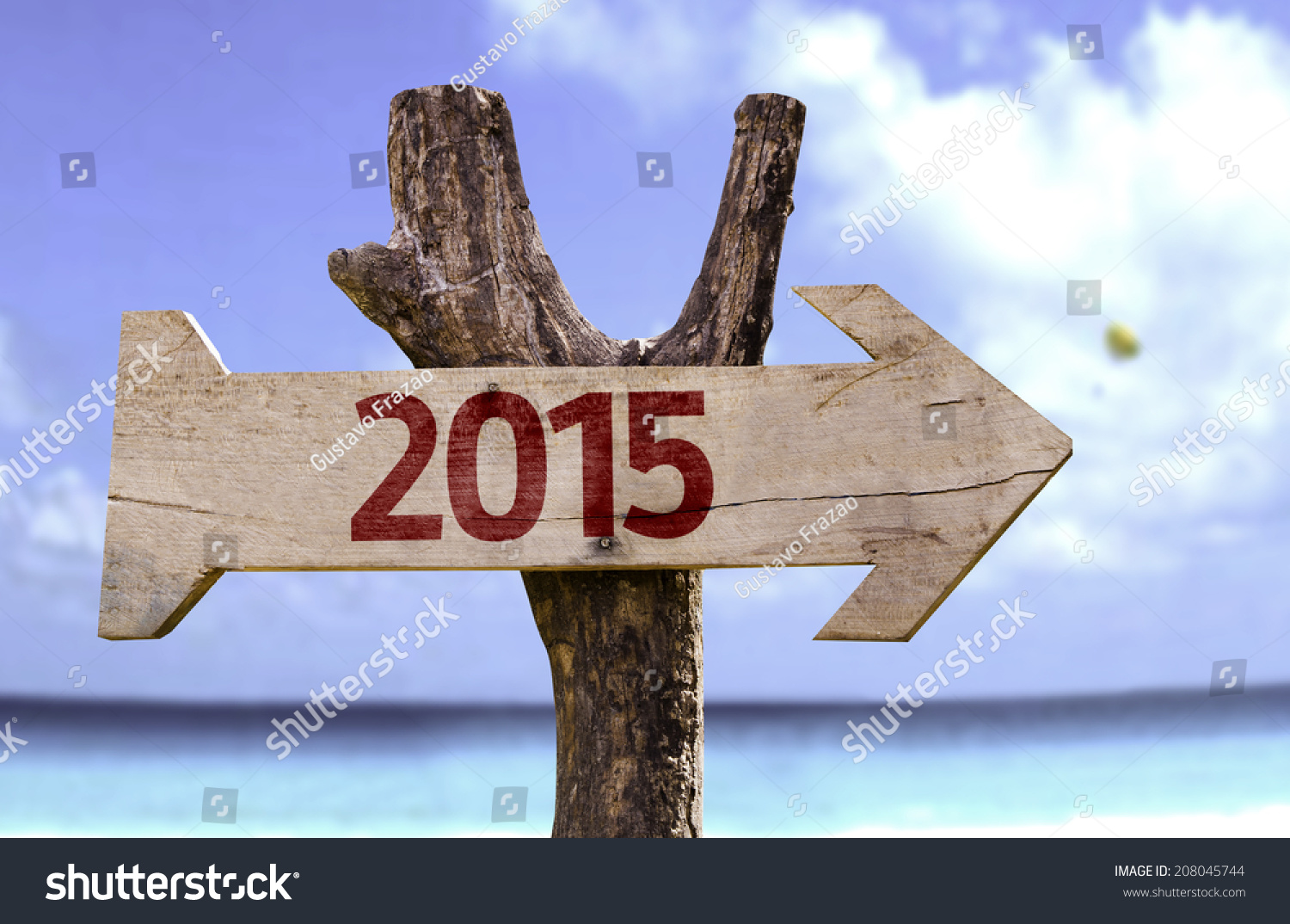 2015 Wooden Sign With A Beach On Background Stock Photo 208045744 : Shutterstock