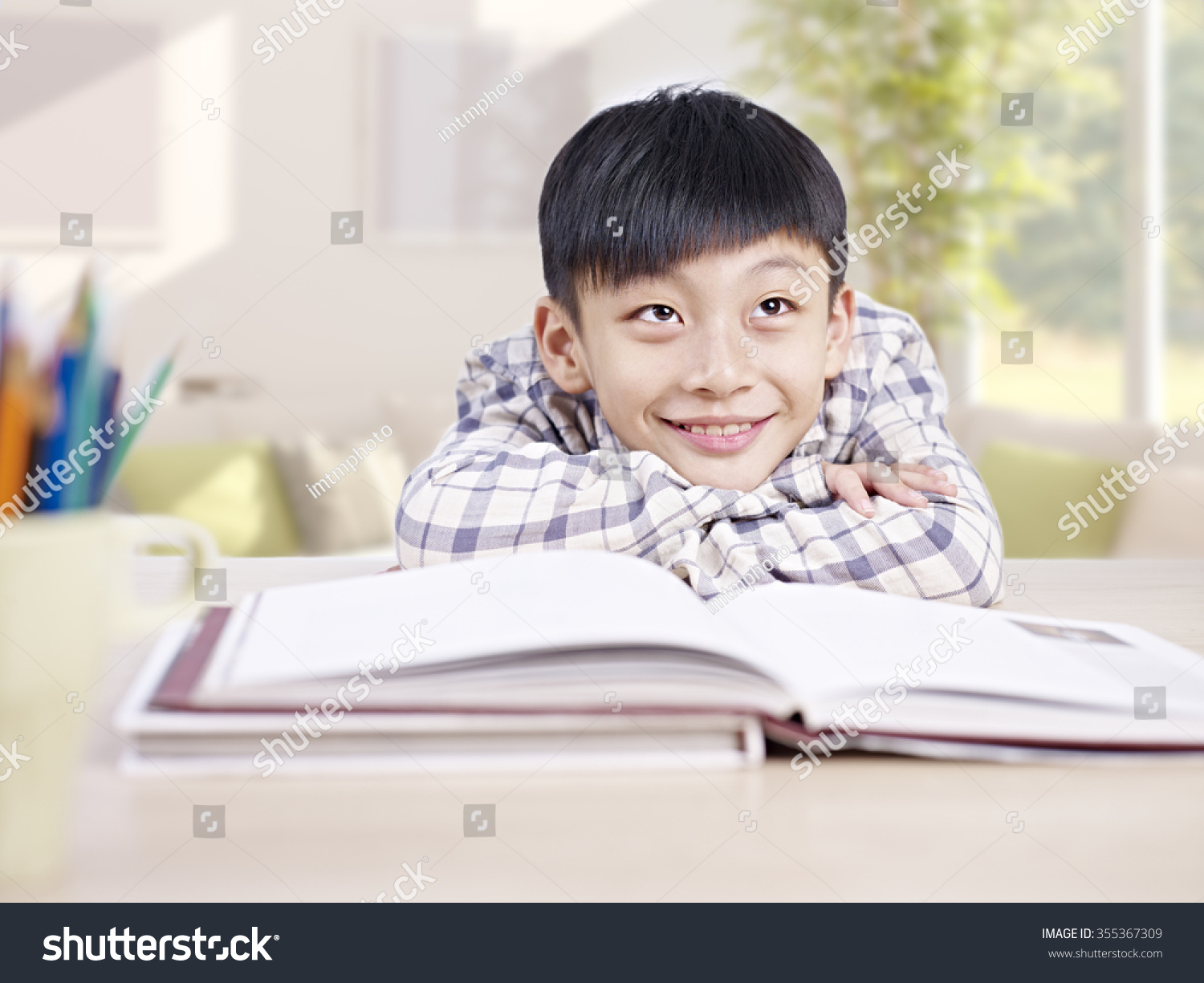 10 Yearold Asian Schoolboy Resting His Stock Photo (Edit Now) 355367309