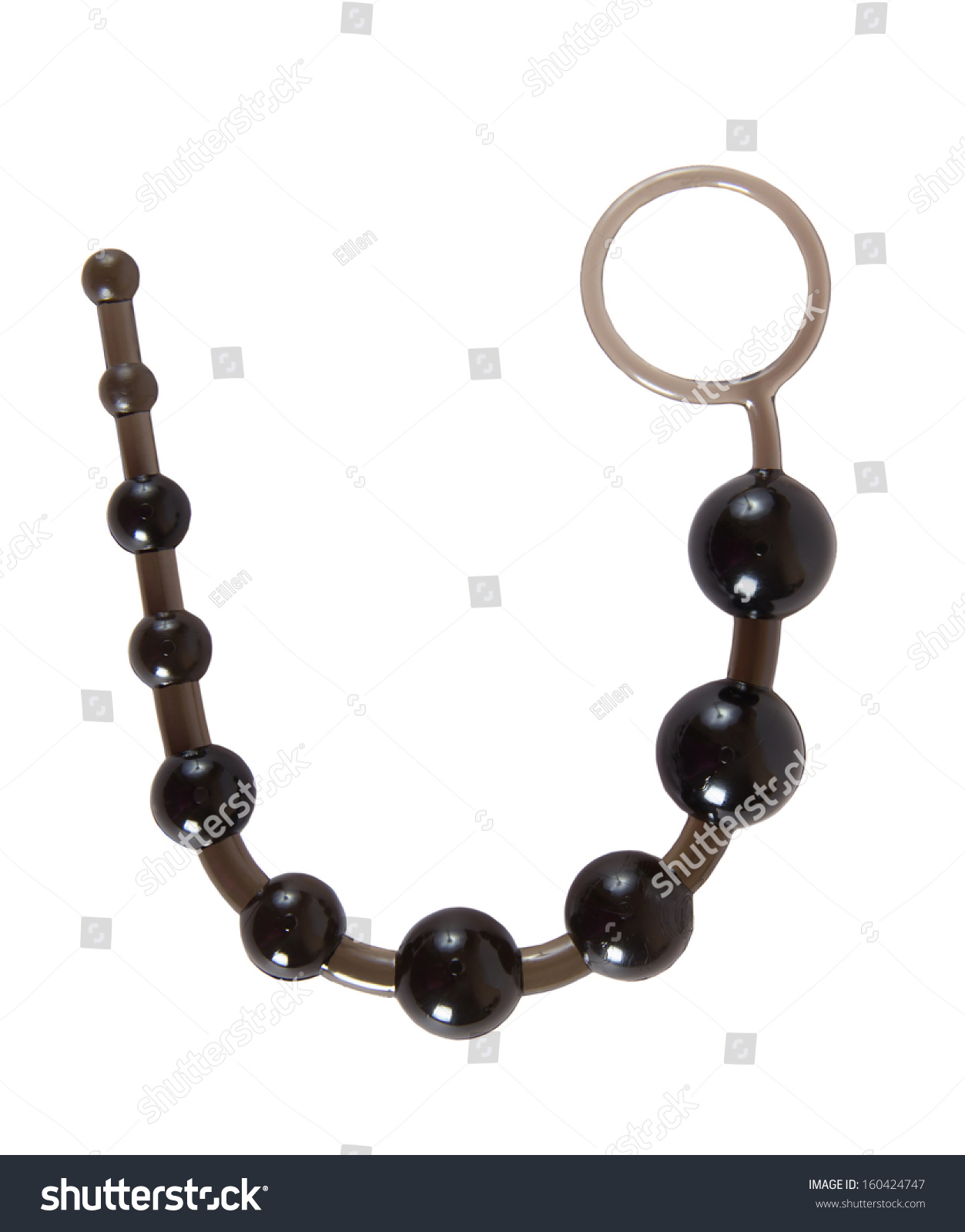 黑色性玩具--肛珠由橡胶或乳胶孤立在白色的-物