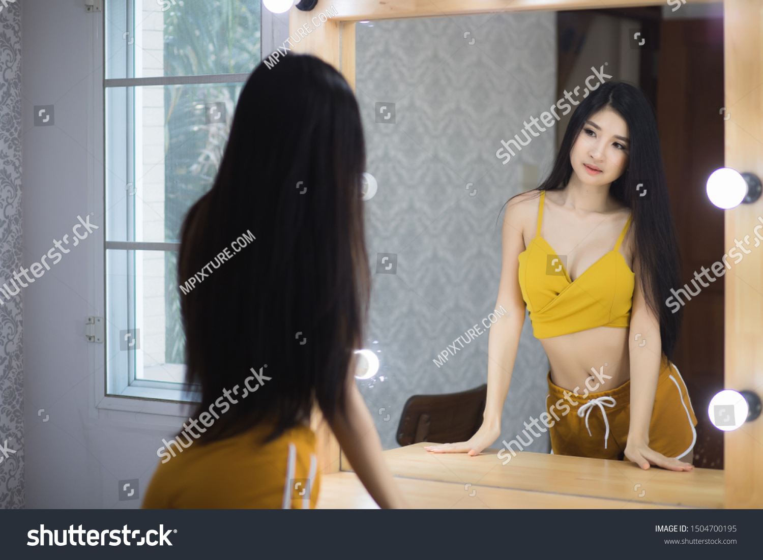Peeping at  asian women in changing room