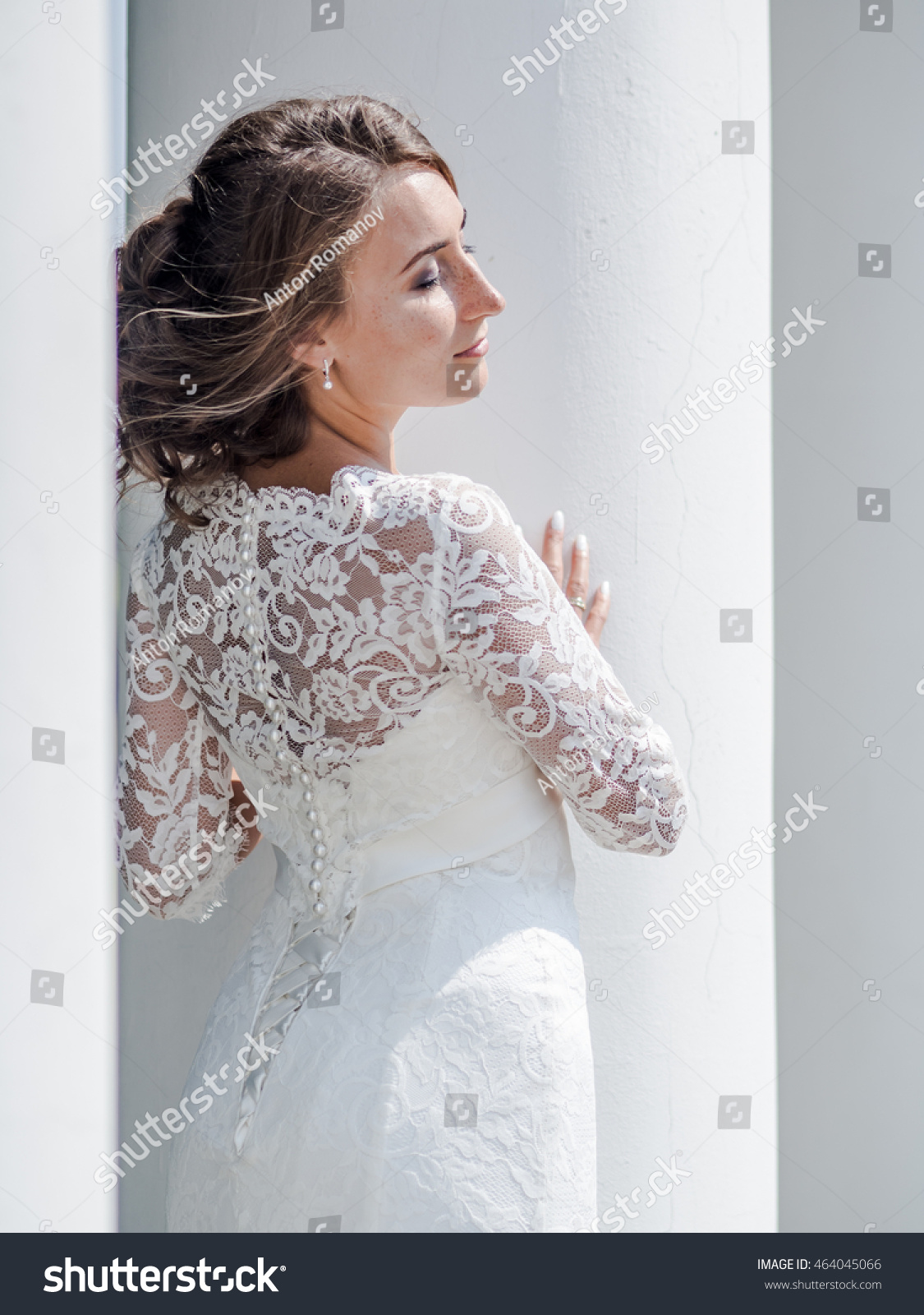 https://image.shutterstock.com/z/stock-photo-a-beautiful-russian-bride-in-a-white-dress-on-a-white-background-464045066.jpg