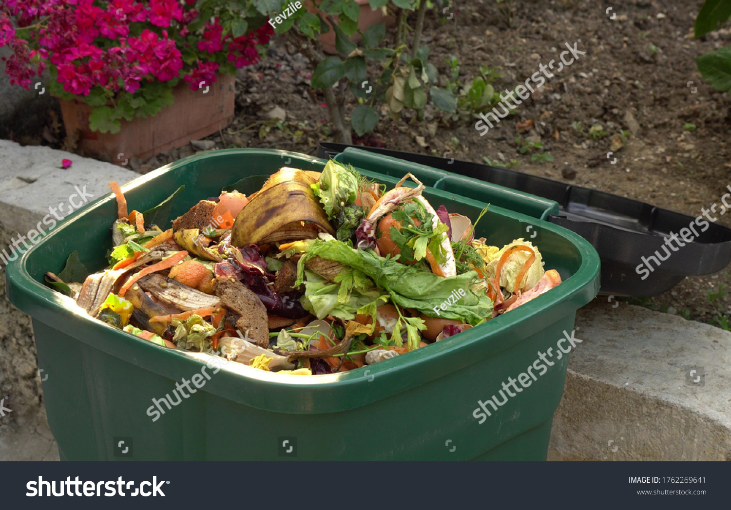 Stock Photo A Bin Filled With Materials That Comprise Green Waste Such As Kitchen Food Wastes And Plant 1762269641 
