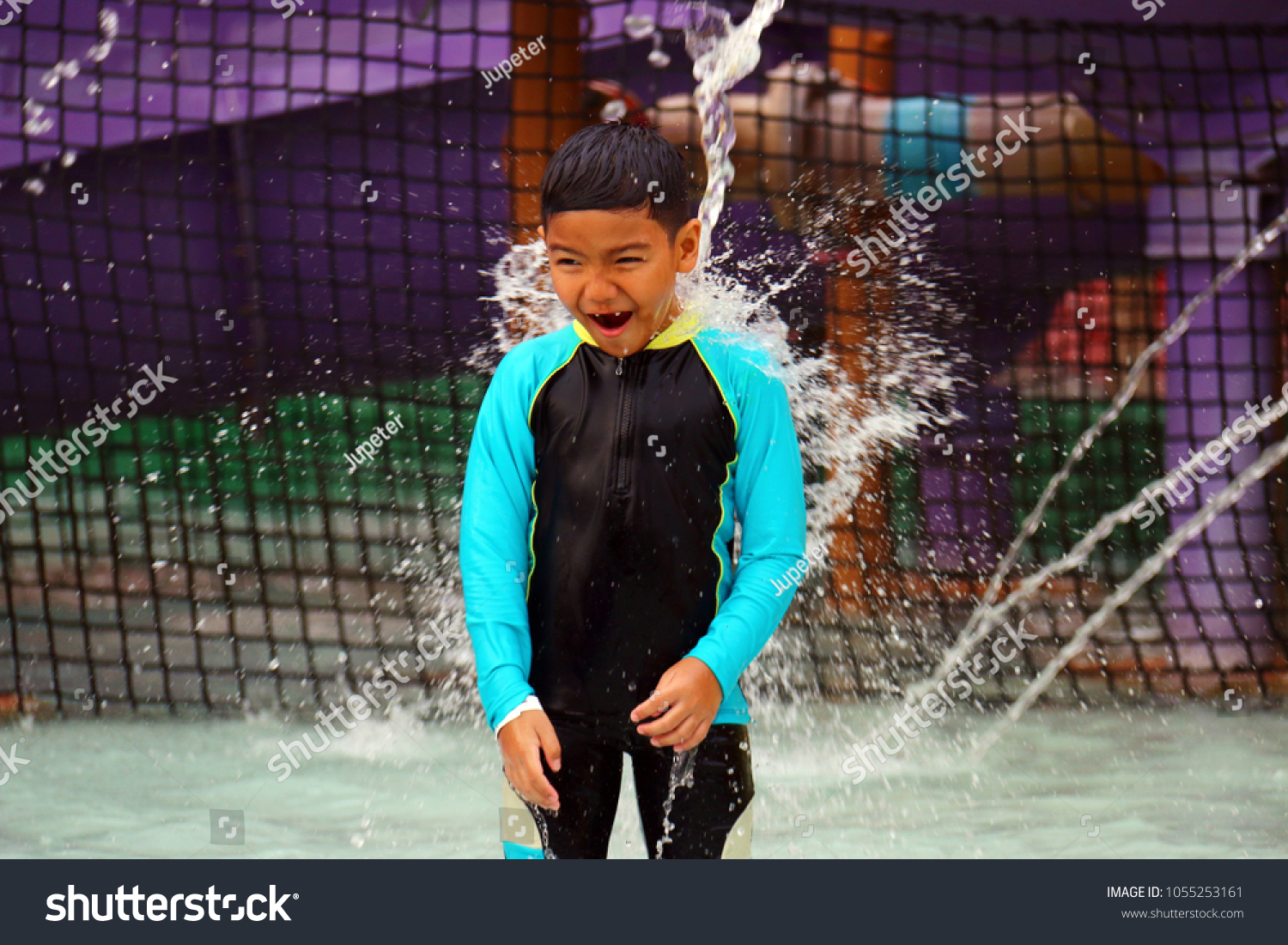 boy wearing girls swimsuit