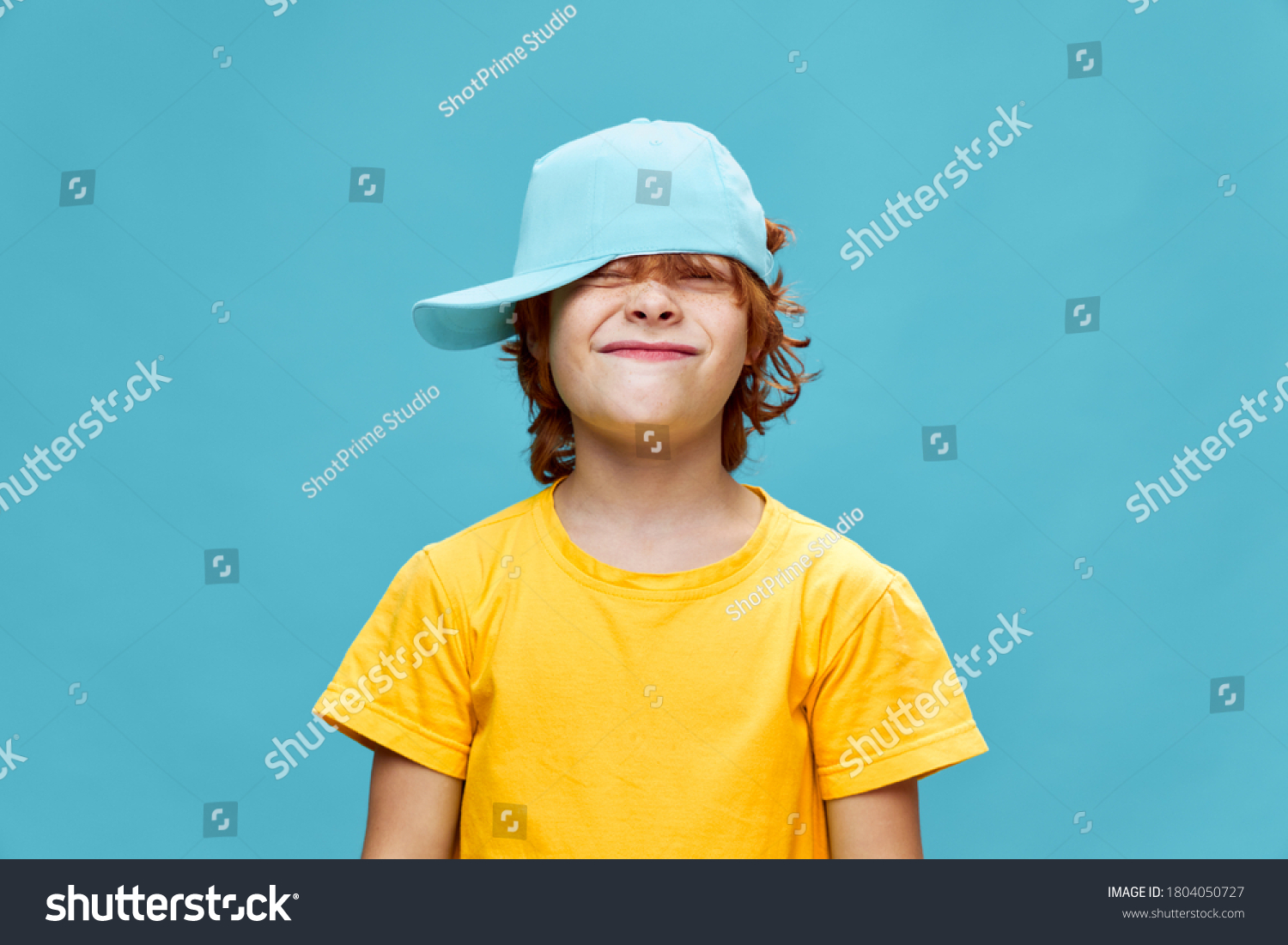 Boy Red Hair Narrowed Eyes Cap Stock Photo 1804050727 | Shutterstock