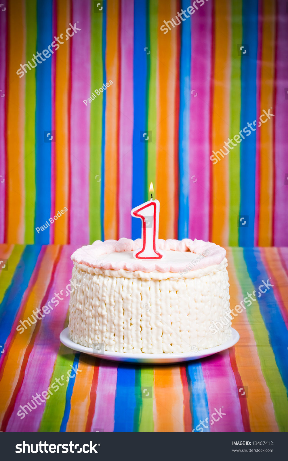 A Cake With A Candle Stock Photo 13407412 : Shutterstock