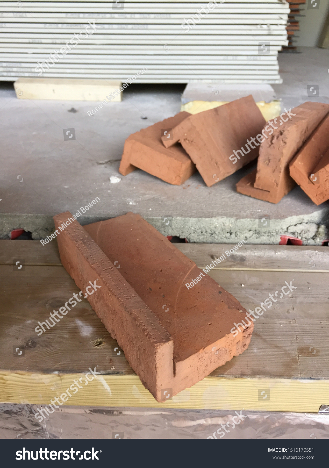 stock-photo-a-close-up-detail-of-a-pistol-brick-with-a-few-more-in-the-background-1516170551.jpg
