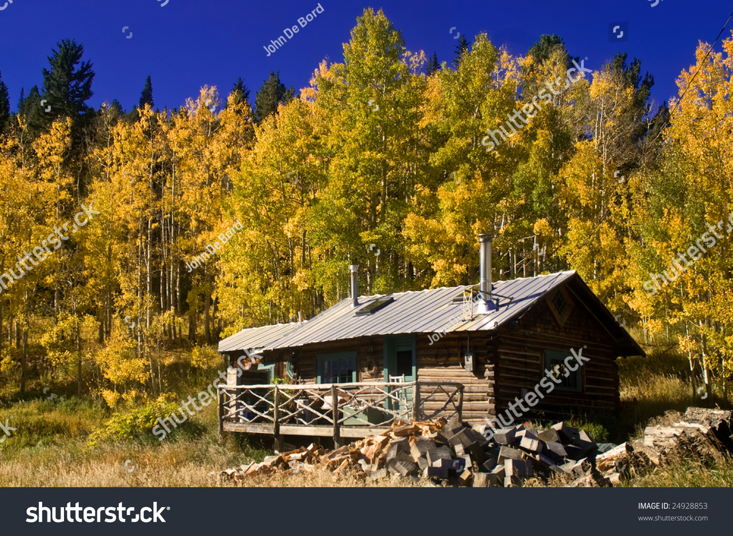 A Country Cabin In Colorado In Autumn With Aspen Trees Stock Photo ...