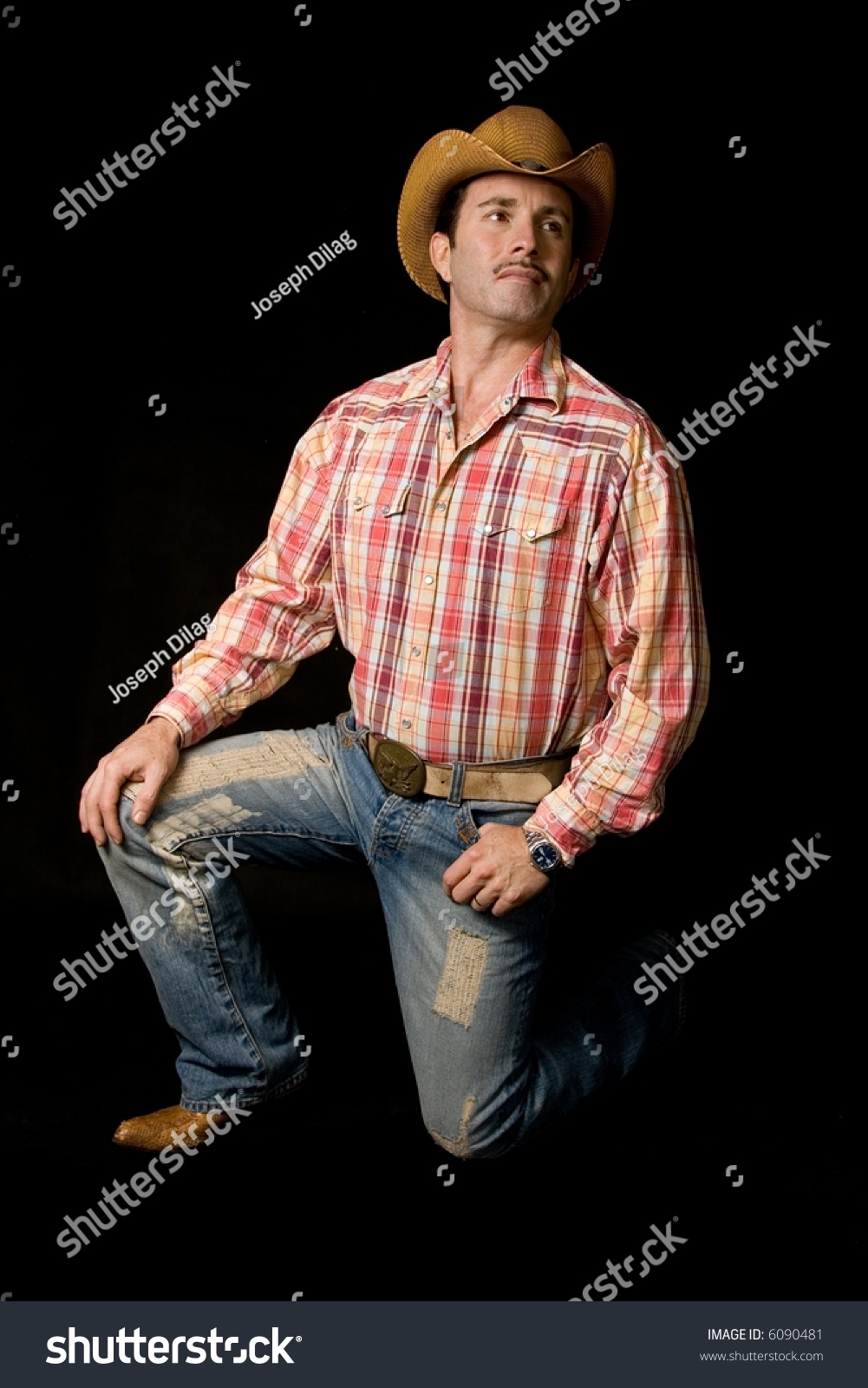 A Cowboy Posing Looking Up Stock Photo 6090481 : Shutterstock