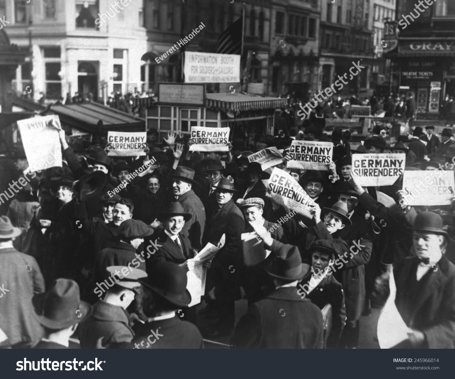 A Crowd At Times Square Holding Up Headlines Reading 'Germany ...