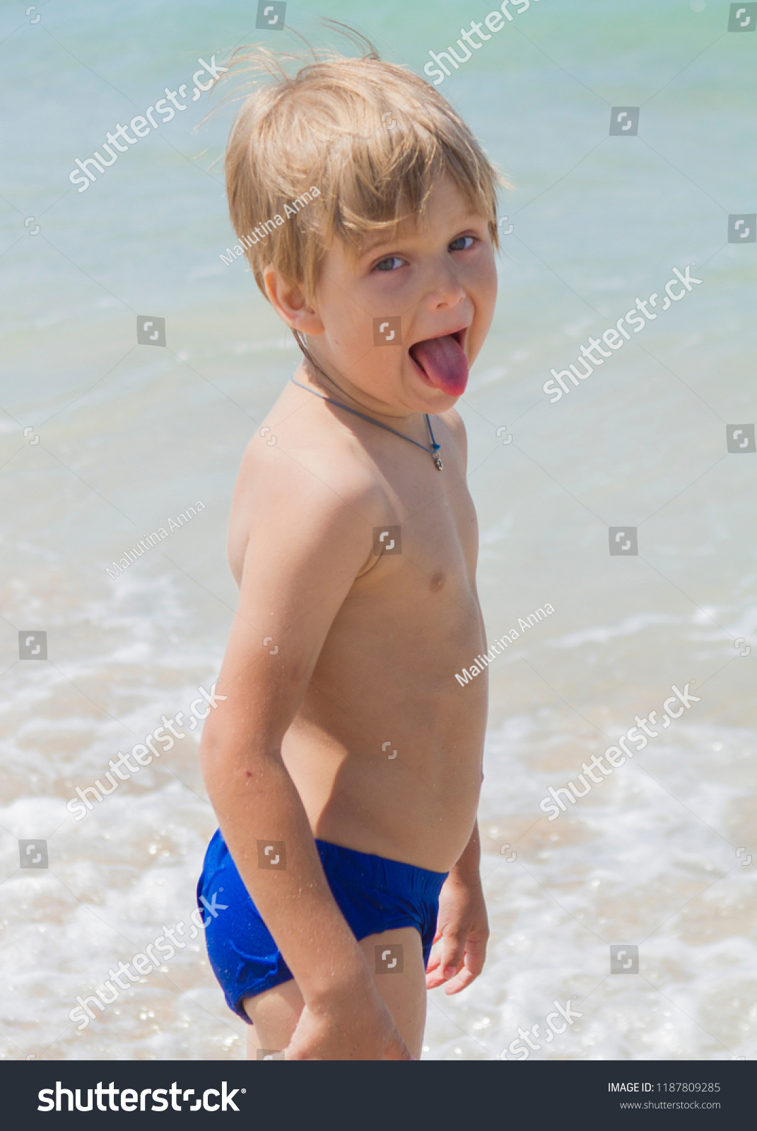 Cute Little Boy On Beach By Stock Photo Edit Now 1187809285