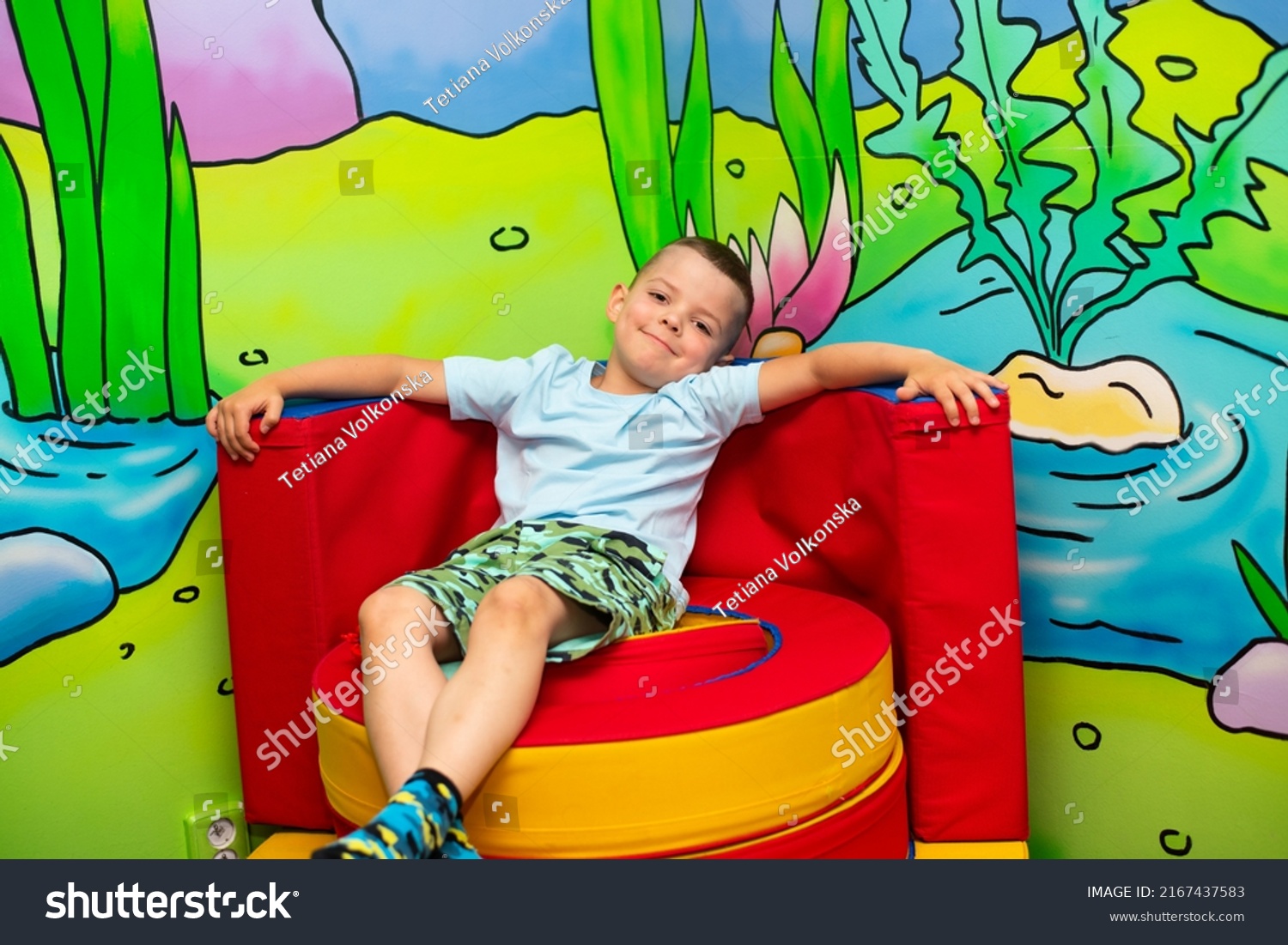 cute-six-year-old-boy-sits-stock-photo-2167437583-shutterstock