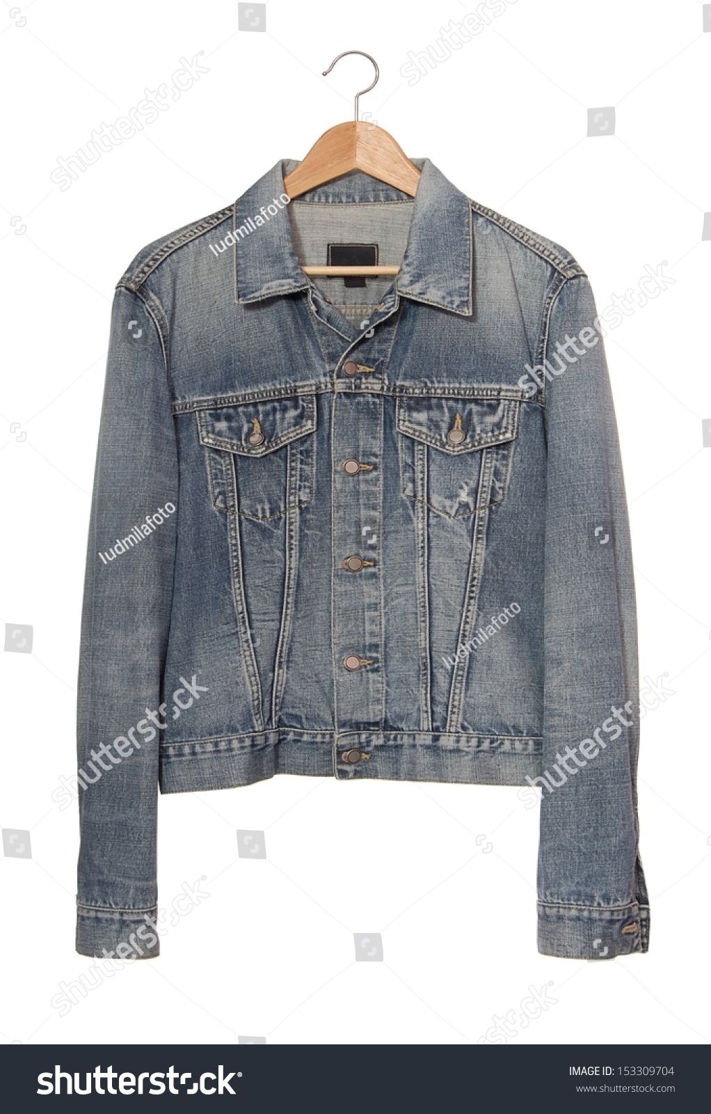 A Denim Jacket Is On Coat-Hanger. Stock Photo 153309704 : Shutterstock