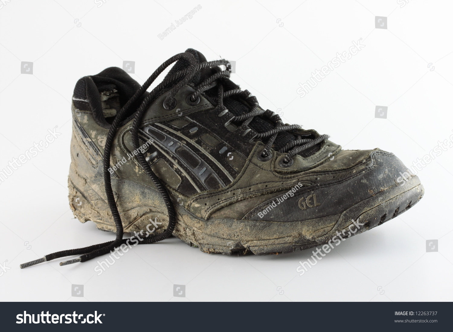 Dirty Used Trail Running Shoe On Stock 