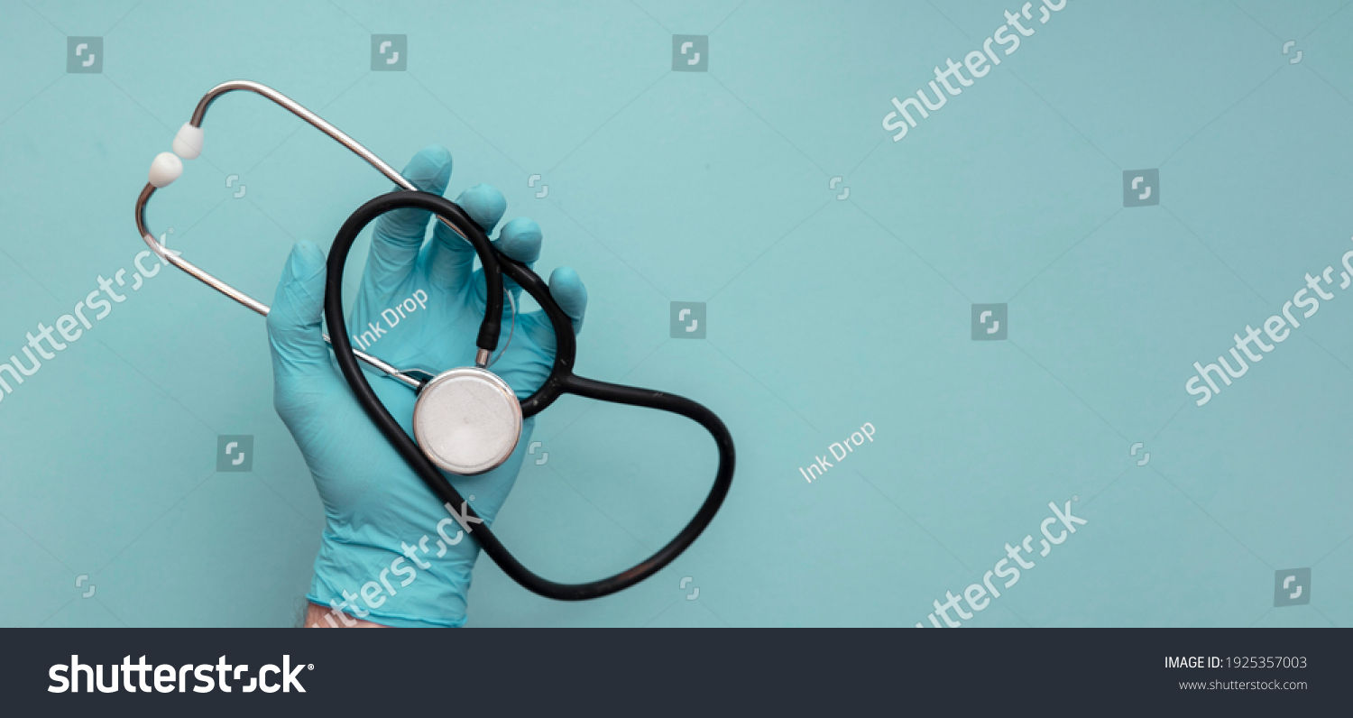 Doctor Wearing Blue Surgical Gloves Holding Stock Photo 1925357003 ...