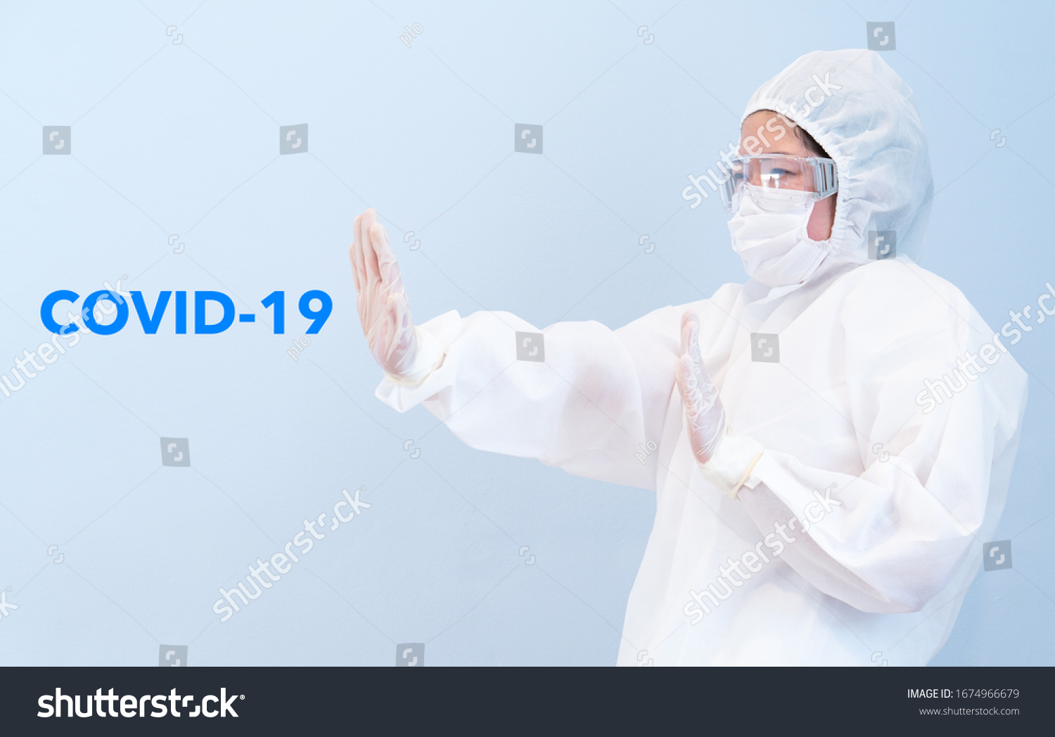 Doctor Wearing Personal Protective Equipment Including Stock Photo 