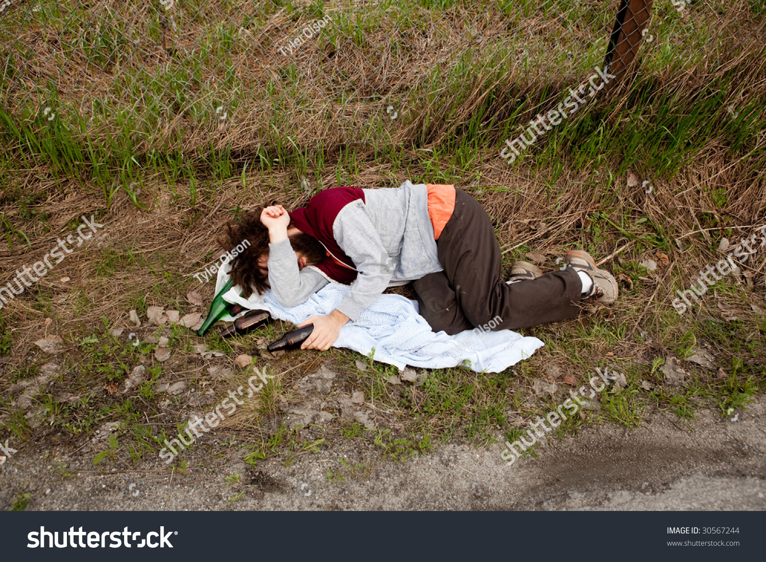 A Drunk Unemployed Person Laying In The Ditch Stock Photo 30567244 ...