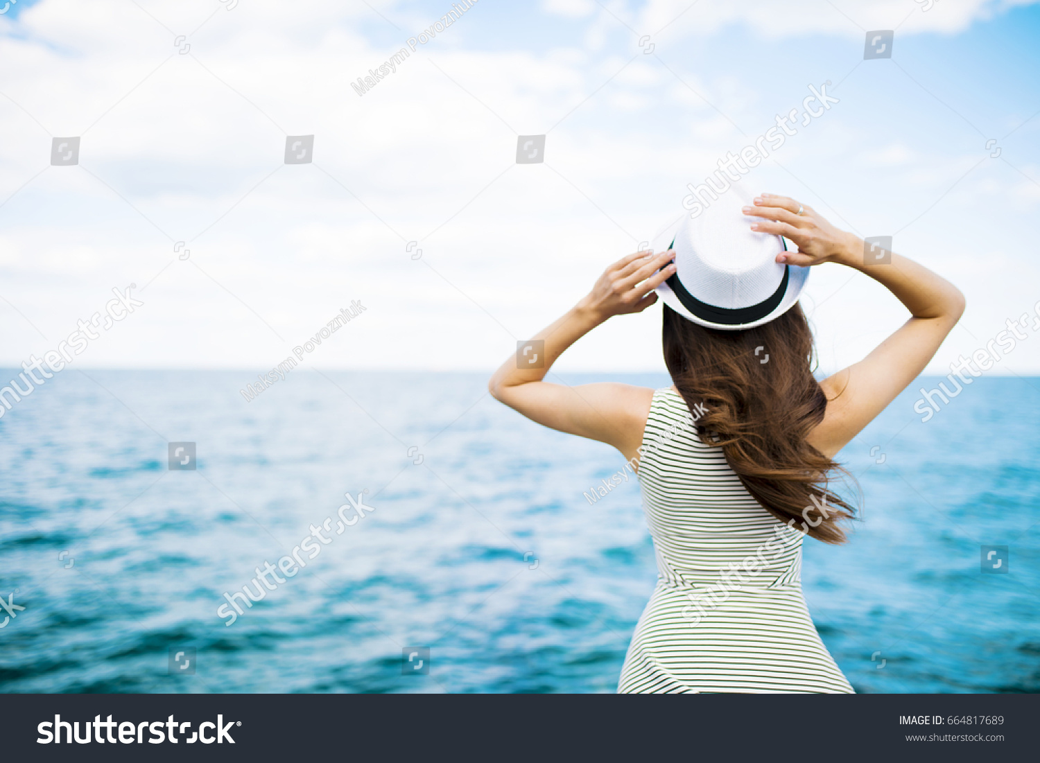 Girl On Beach By Sea Looks Stock Photo Edit Now