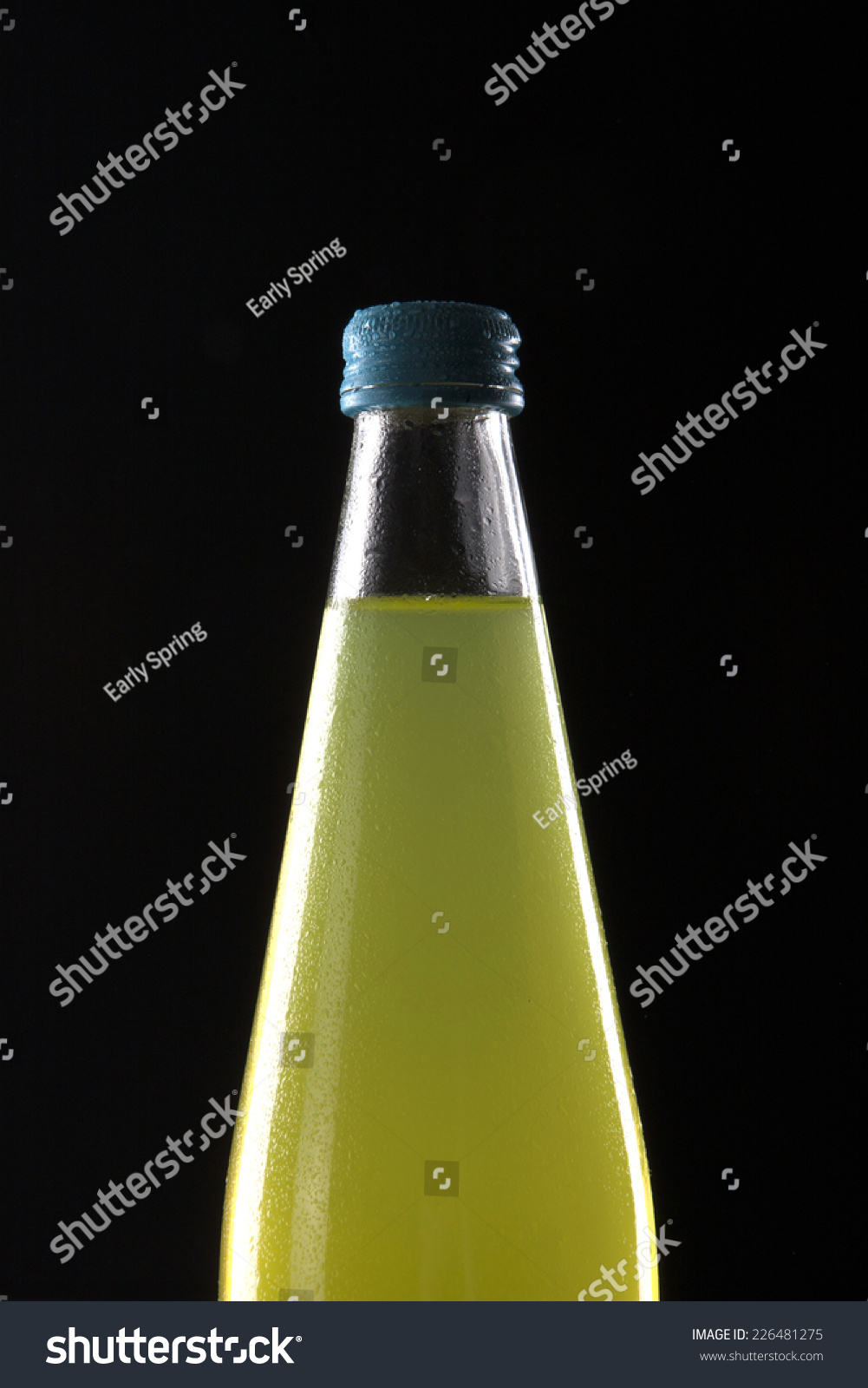 Download Glass Bottle Yellow Soft Drink Isolated Stock Photo Edit Now 226481275 Yellowimages Mockups