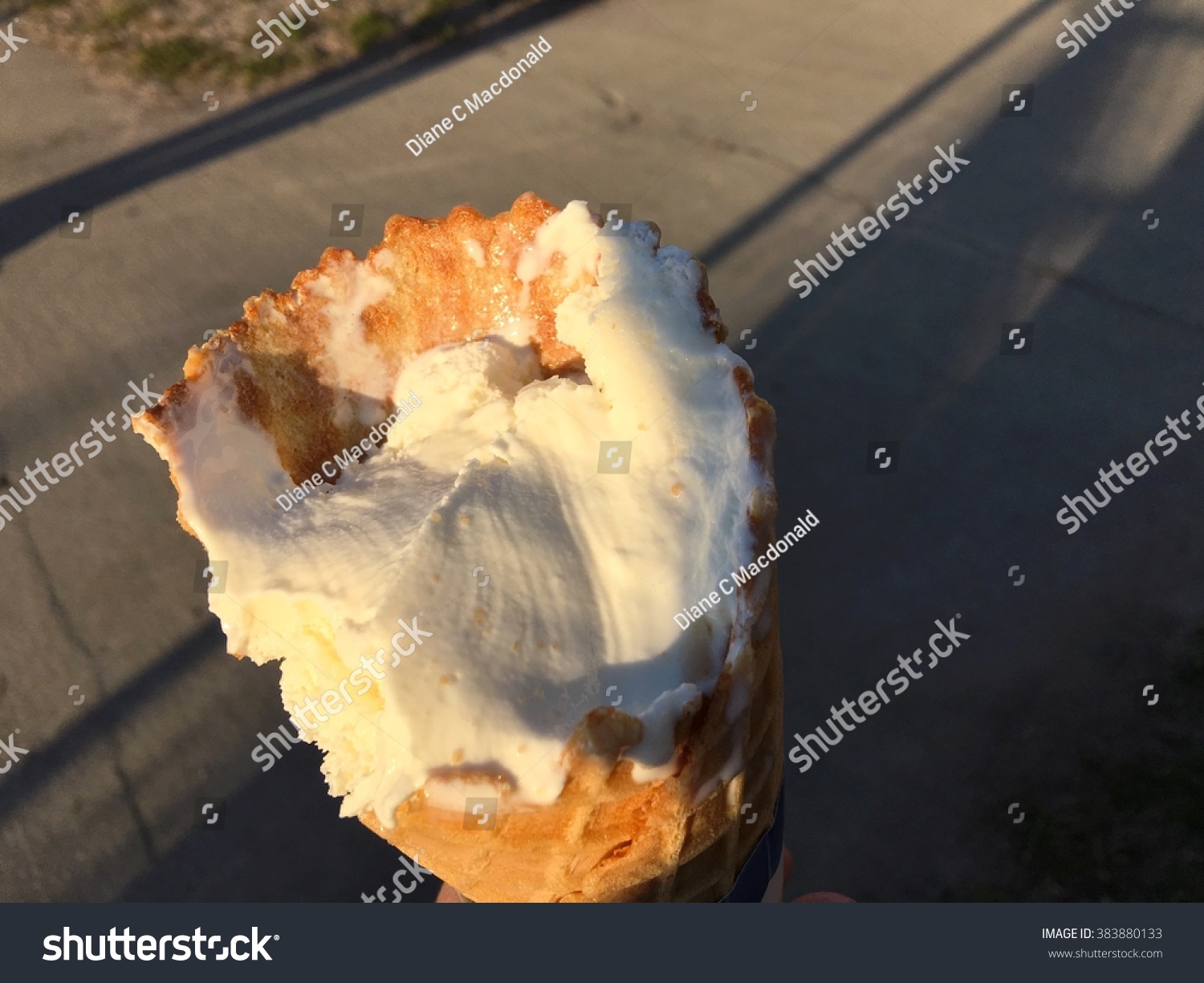 Half Eaten Vanilla Ice Cream Cone Stock Photo Edit Now