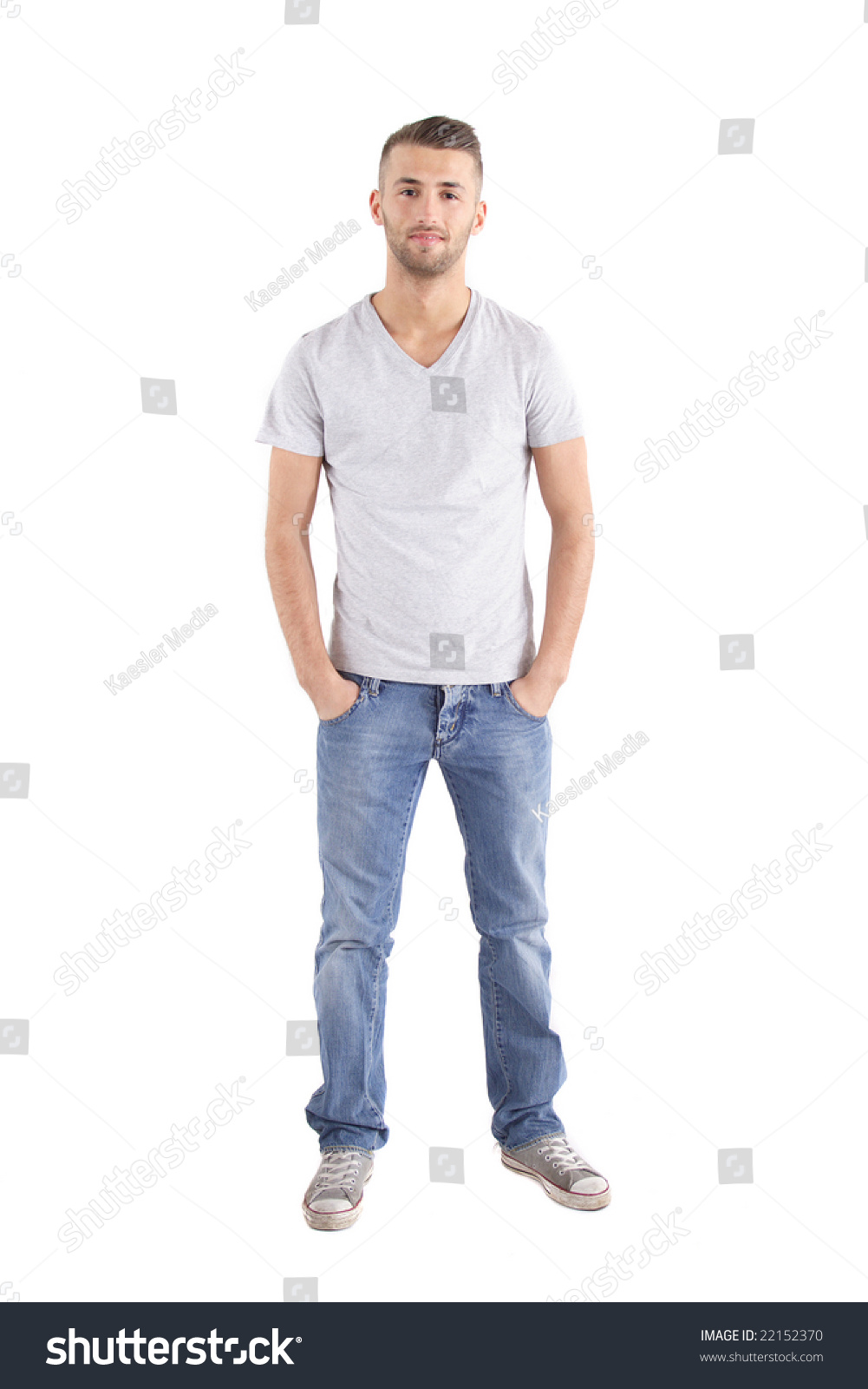 A Handsome Man Standing In Front Of A White Background Stock Photo ...