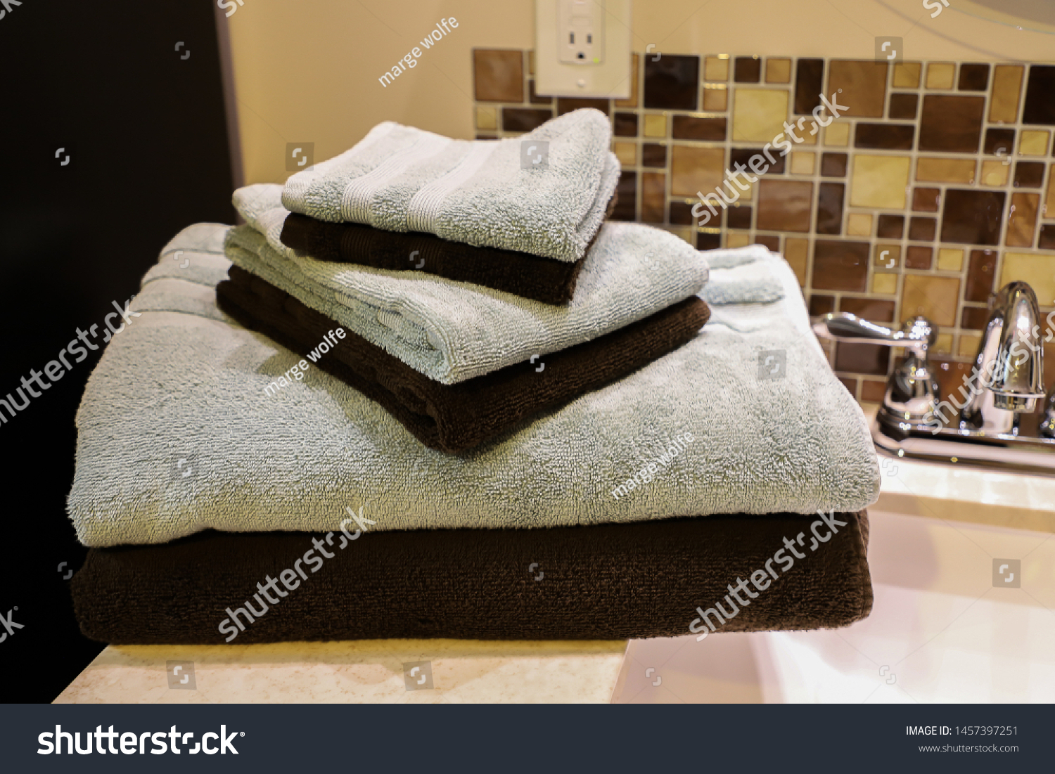 brown and green towels