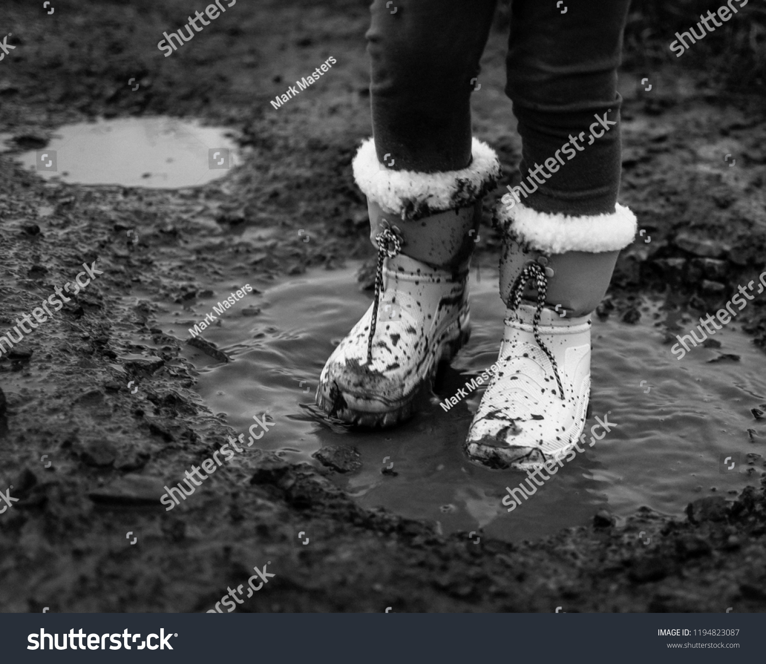 Little Girls Fluffy Boots Jumping Muddy 
