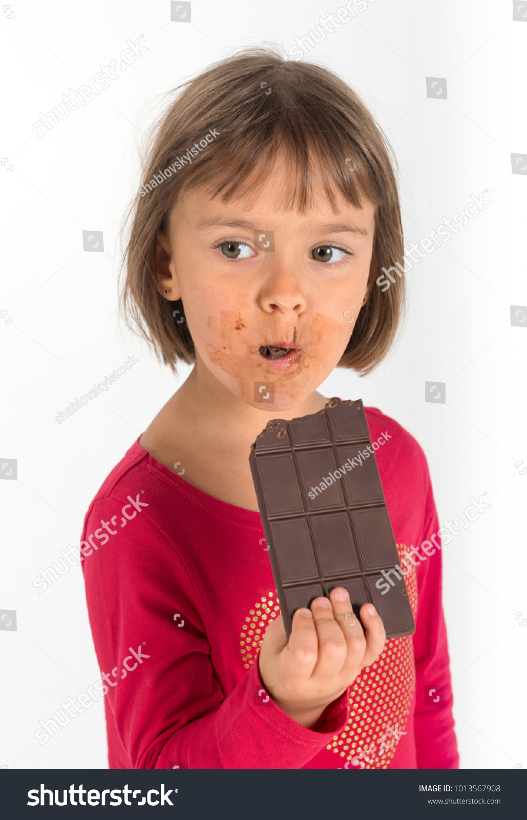 Little Kid Girl Eating Milk Chocolate Stock Photo 1013567908 | Shutterstock