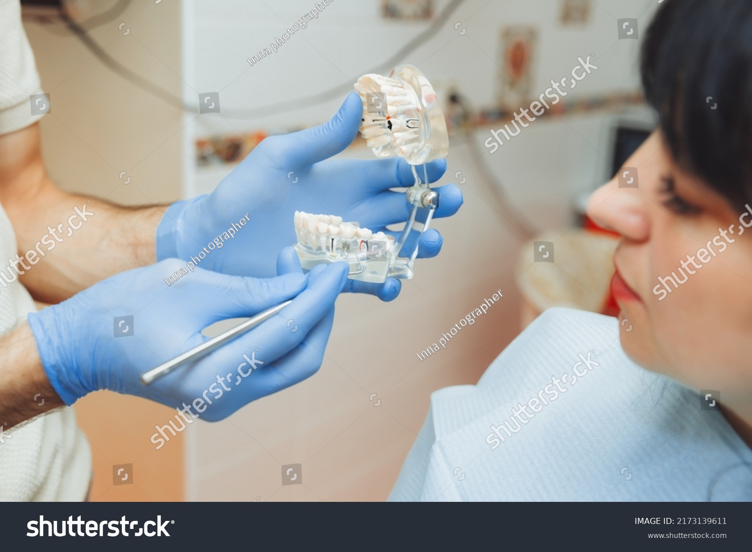 Male Orthodontist Dentist Shows Artificial Plastic Stock Photo