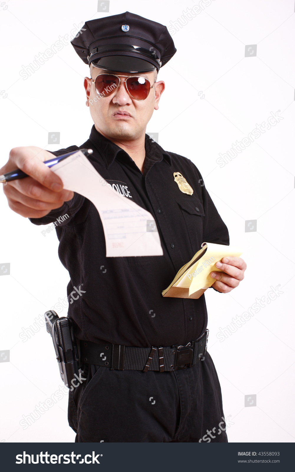 Male Police Officer Handing Out Citation Stock Photo Edit Now