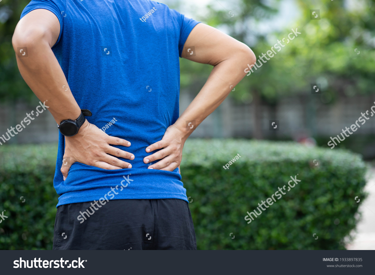 43 967 Hurt Back Images Stock Photos Vectors Shutterstock   Stock Photo A Man Back Pain After Exercise Concept It Happens Often In Athletes Practice Overtain Lifting Heavy 1933897835 