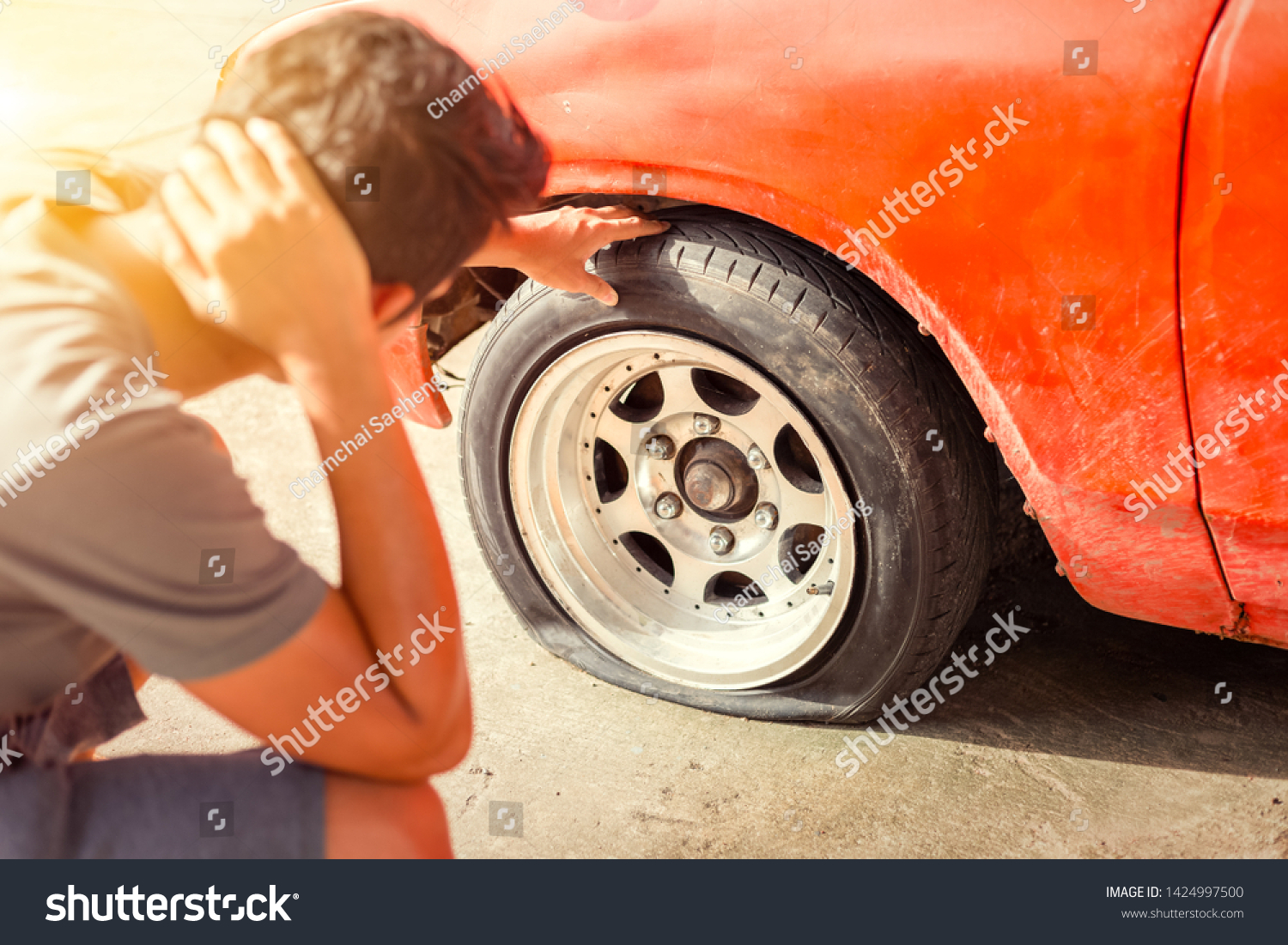 man-headache-when-car-breakdown-wheel-stock-photo-1424997500-shutterstock