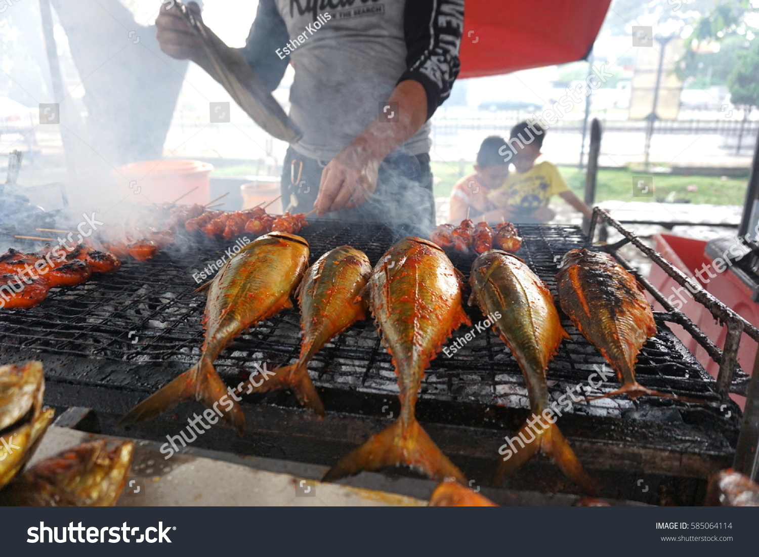 Man Tending His Grill Stall Local Stock Photo 585064114 | Shutterstock