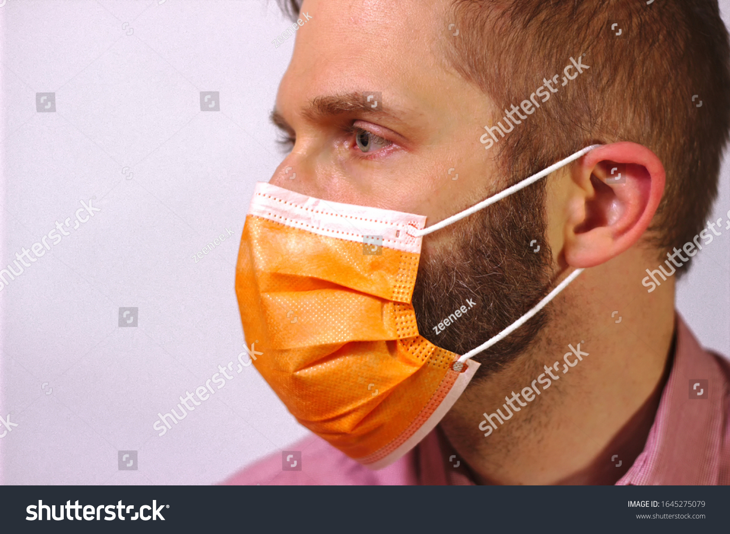 Download Man Beard Orange Surgical Mask Looks Stock Photo Edit Now 1645275079 PSD Mockup Templates