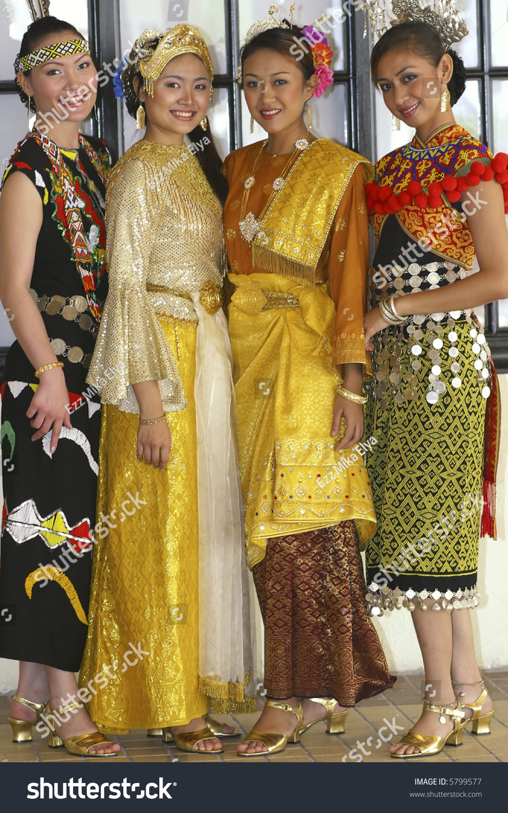 A Multi Ethnic Races In Malaysia Wearing Traditional Costumes Stock ...