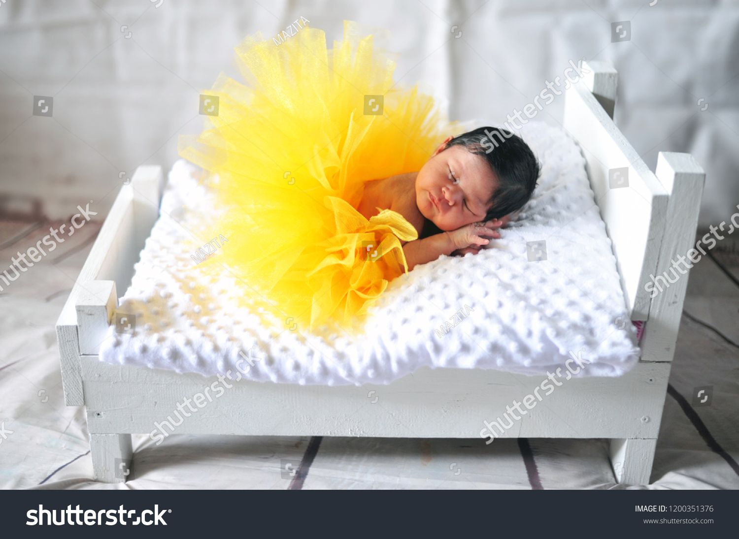 newborn baby girl yellow dress