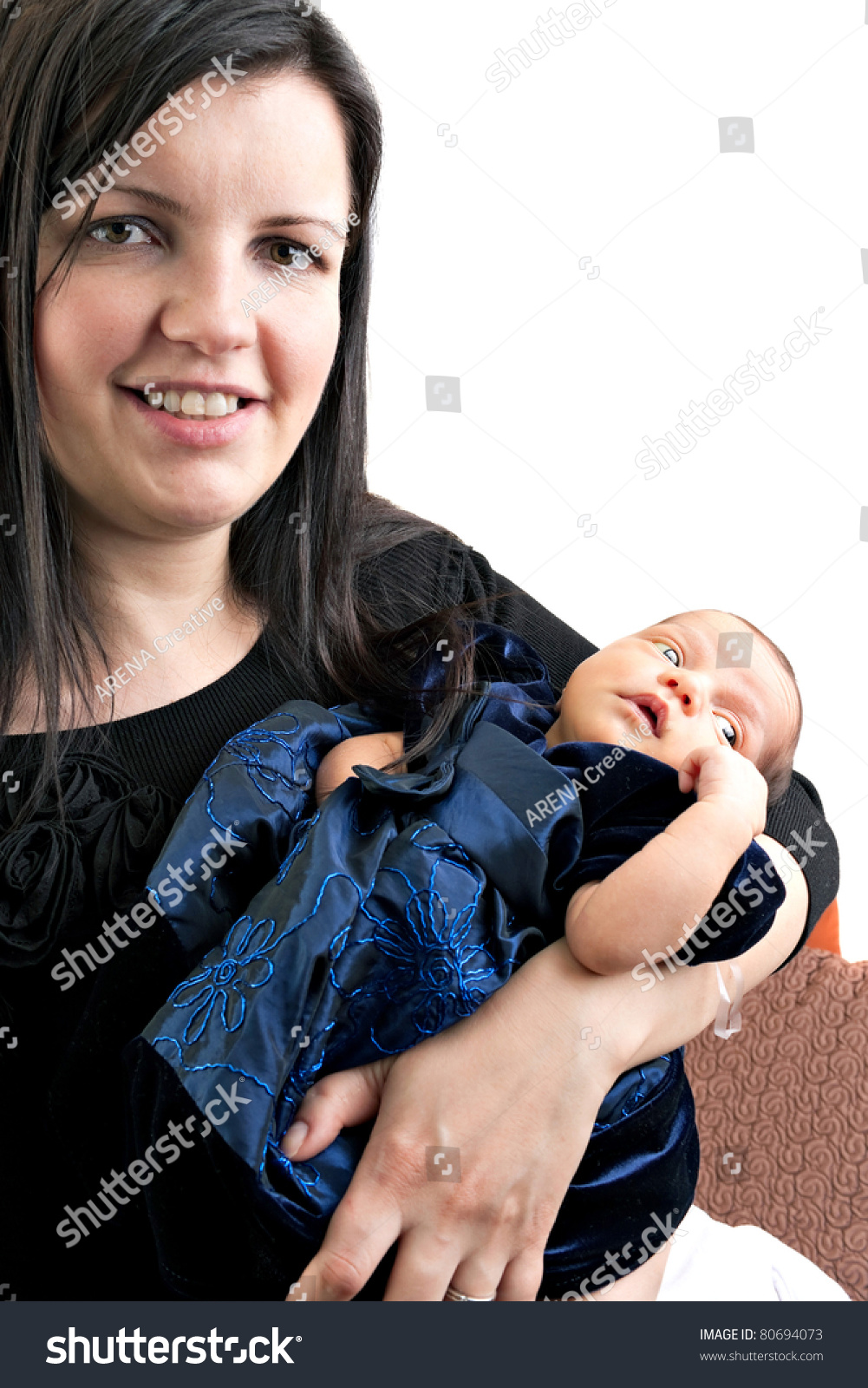 A Newborn Infant Being Held In The Arms Of Her Smiling Mother Isolated ...