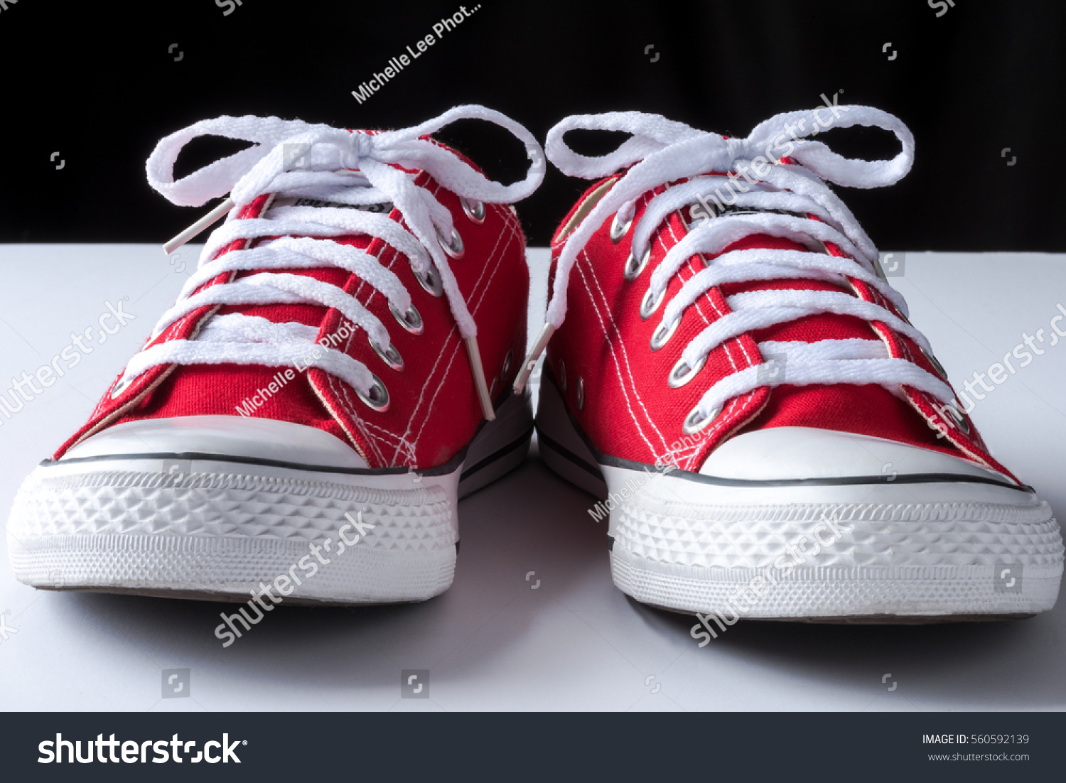 red canvas tennis shoes