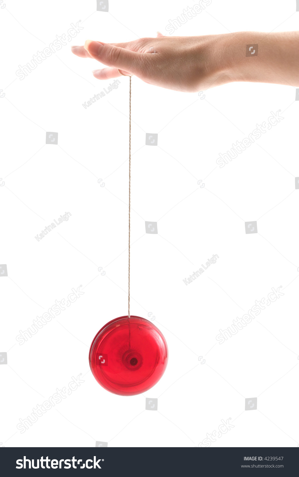 A Person'S Hand Playing With A Yo-Yo, Isolated On White. Stock Photo ...