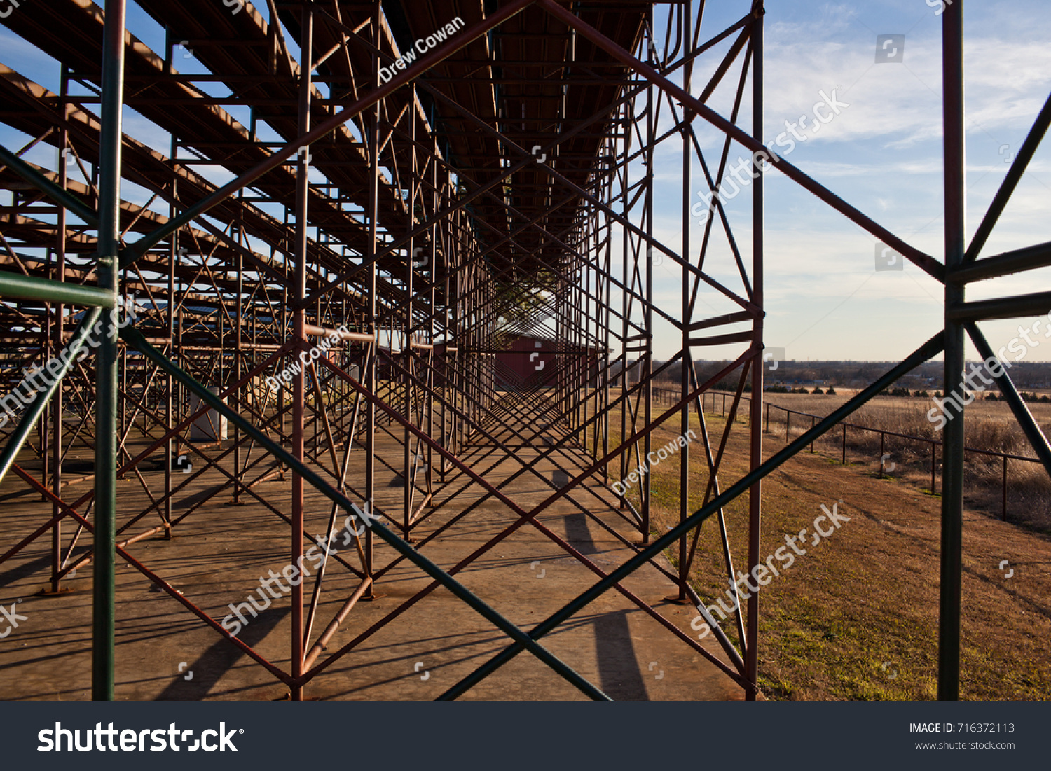 behind bleachers