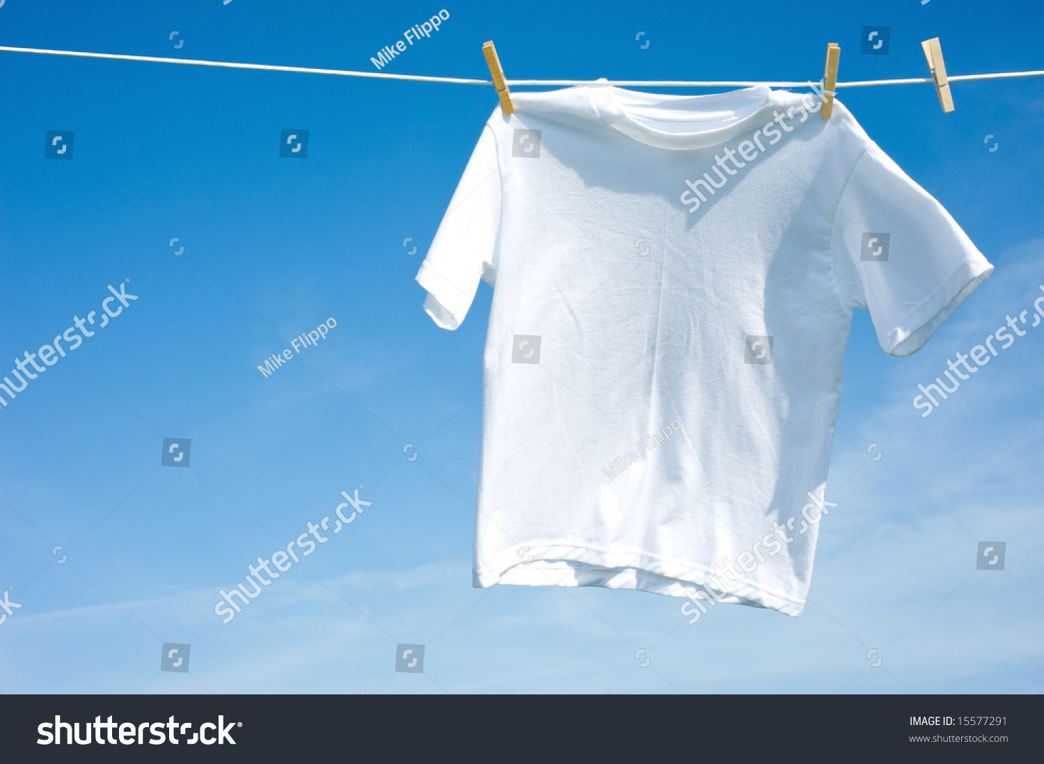 Plain White Tshirt Hanging On Clothesline Stock Photo (Edit Now) 15577291